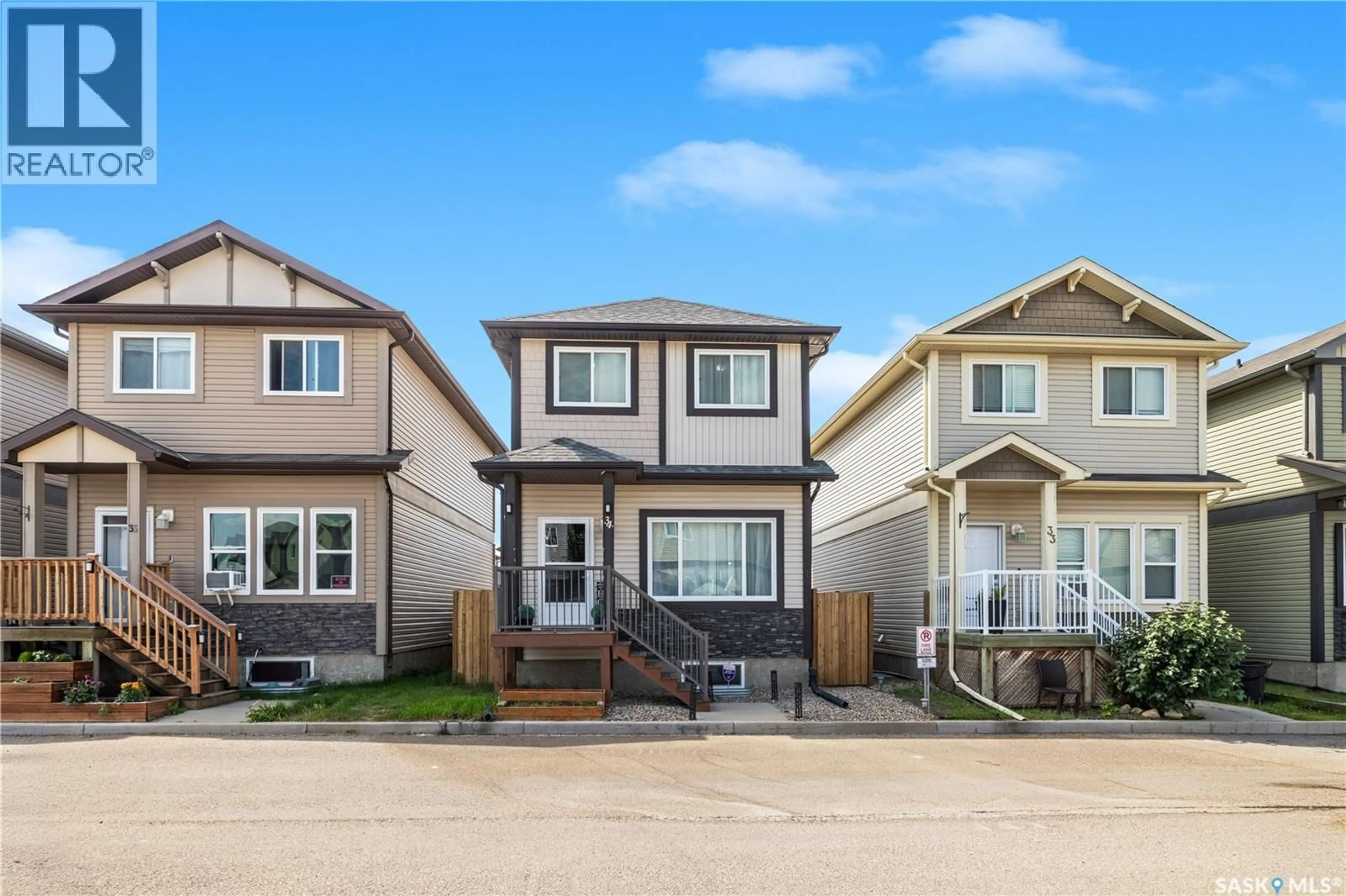 Home with vinyl exterior material, street for E - 34 235 ROSEWOOD BOULEVARD, Saskatoon Saskatchewan S7V0J2