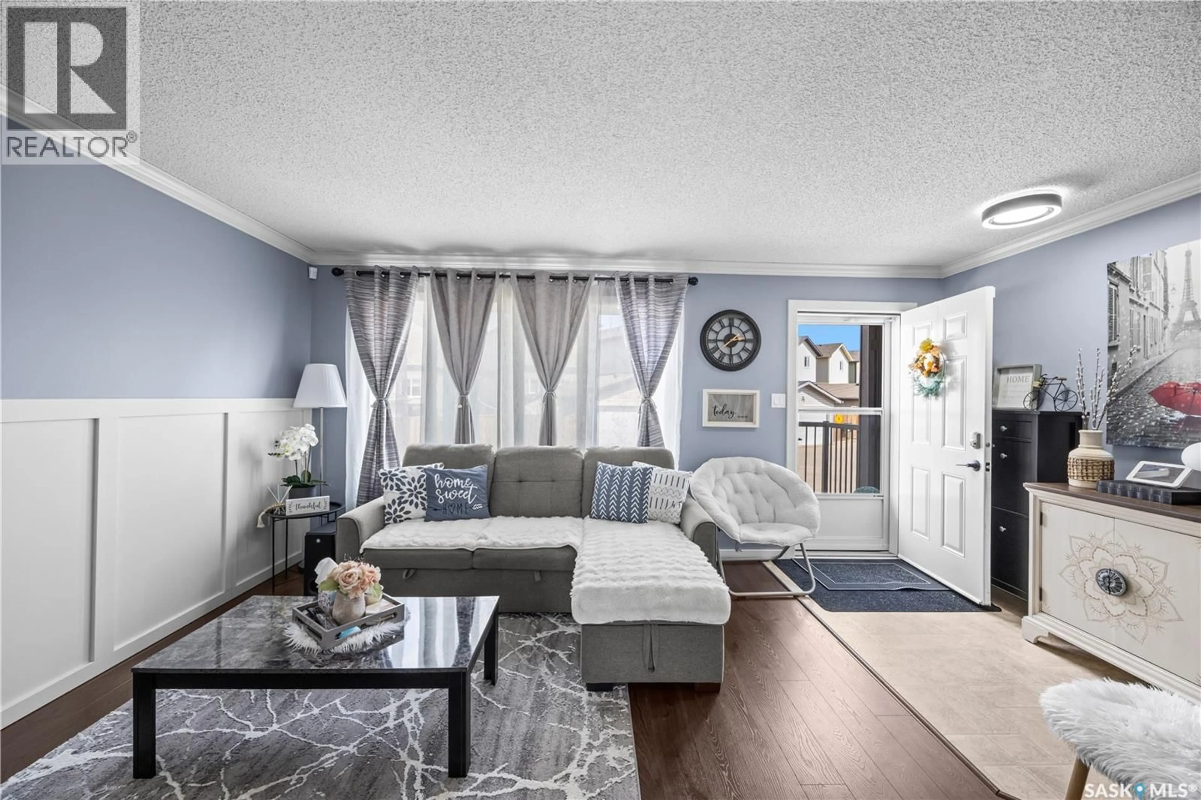 Living room with furniture, unknown for E - 34 235 ROSEWOOD BOULEVARD, Saskatoon Saskatchewan S7V0J2