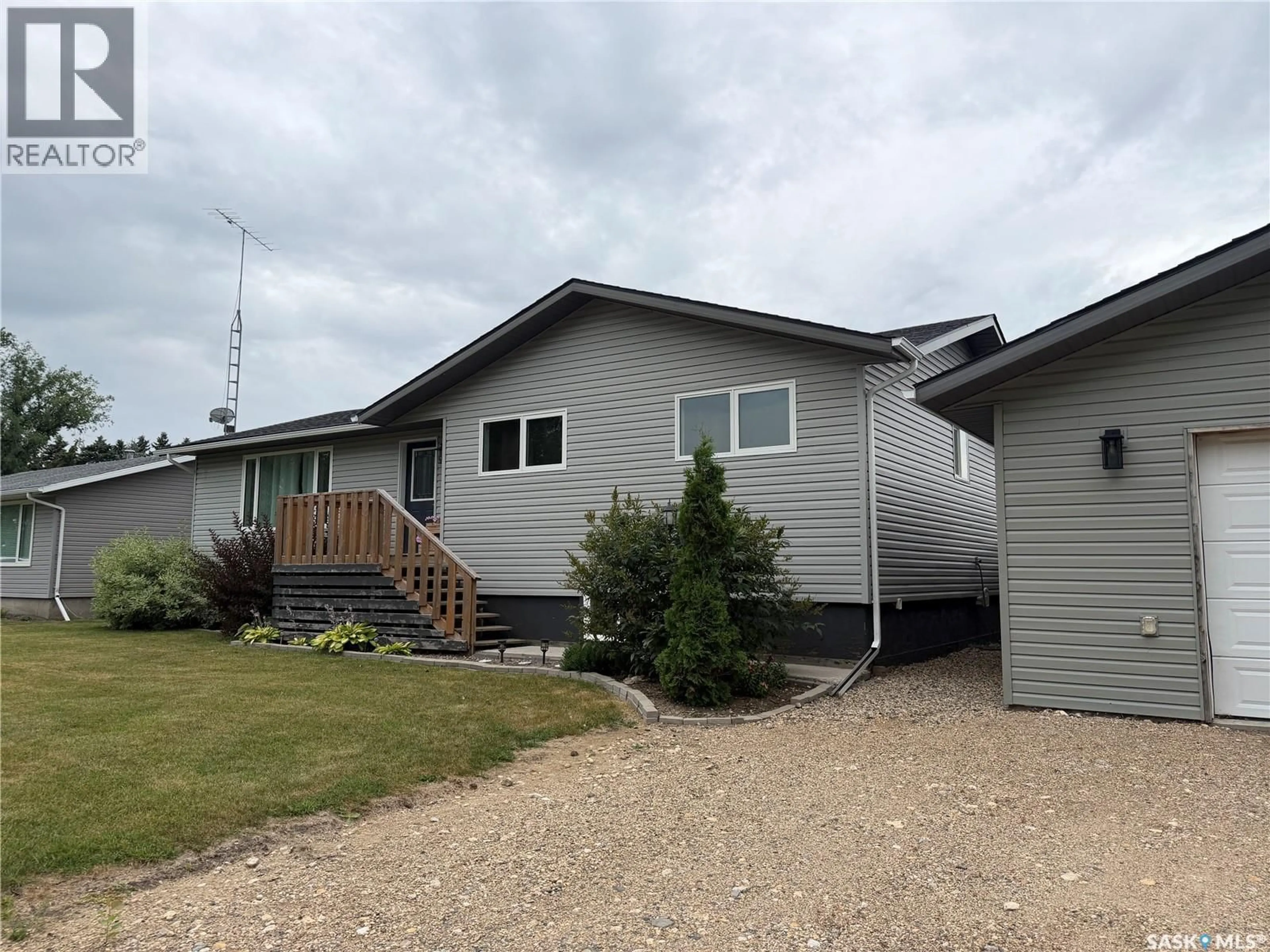 A pic from outside/outdoor area/front of a property/back of a property/a pic from drone, street for 123 RAILWAY AVENUE, Lake Lenore Saskatchewan S0K2J0