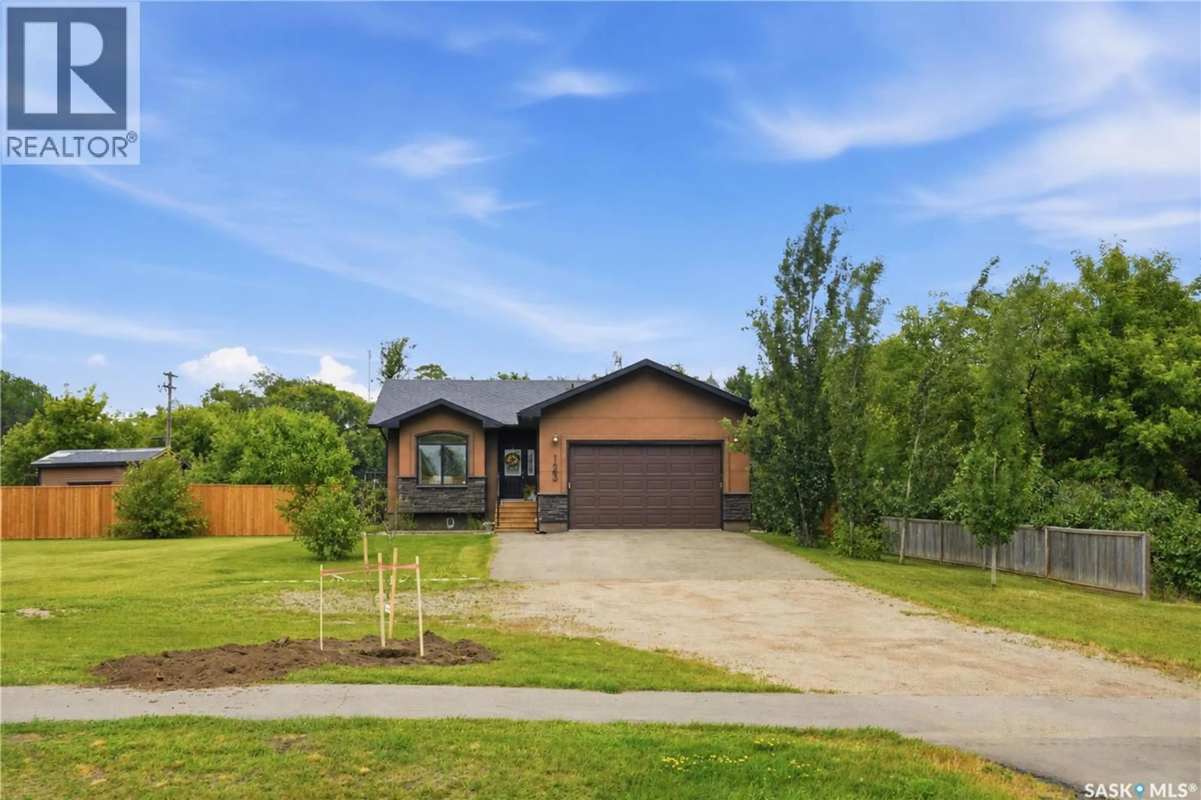 A pic from outside/outdoor area/front of a property/back of a property/a pic from drone, street for 123 RAILWAY AVENUE, Dundurn Saskatchewan S0K1K0