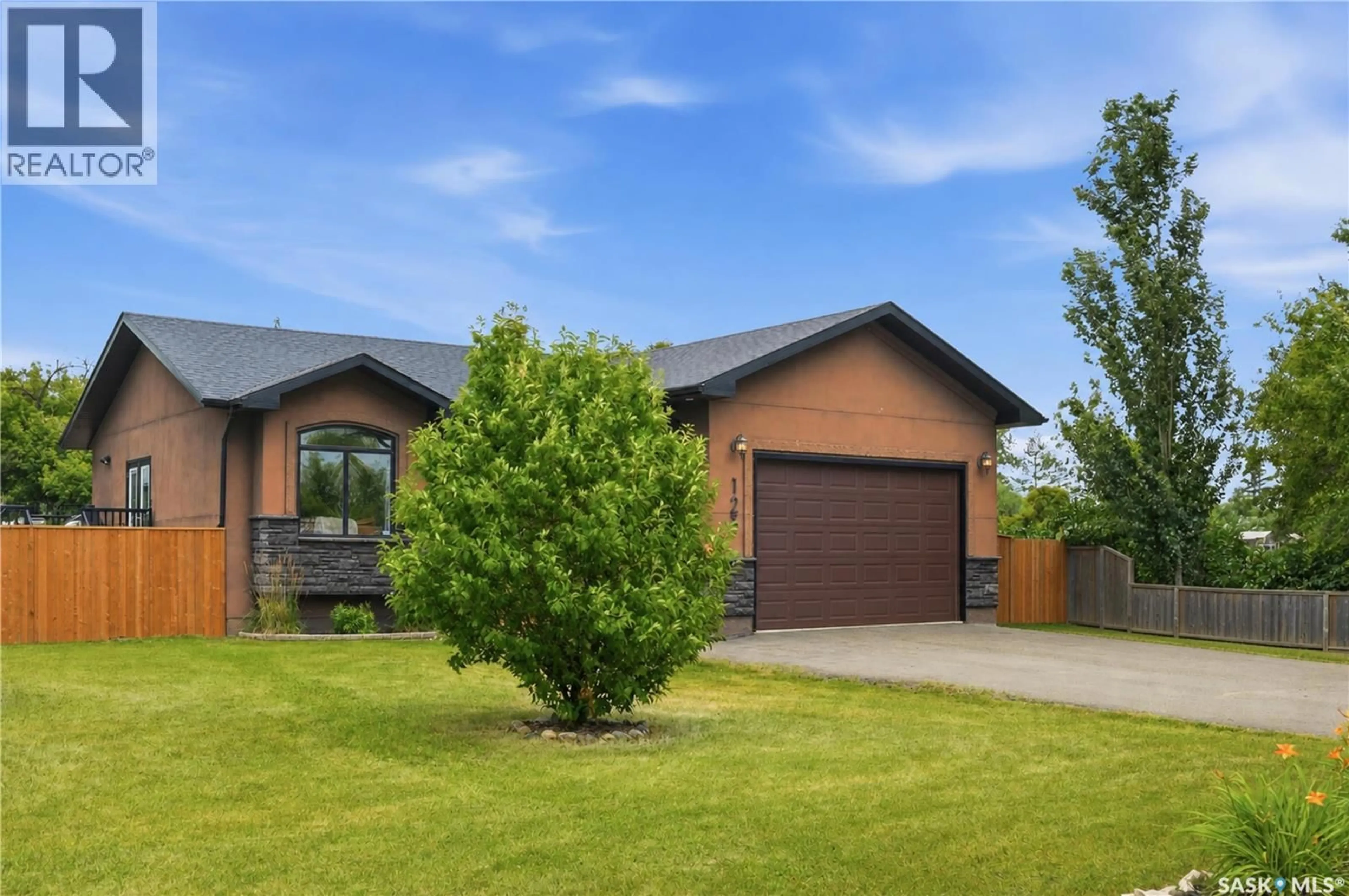 Home with brick exterior material, street for 123 RAILWAY AVENUE, Dundurn Saskatchewan S0K1K0