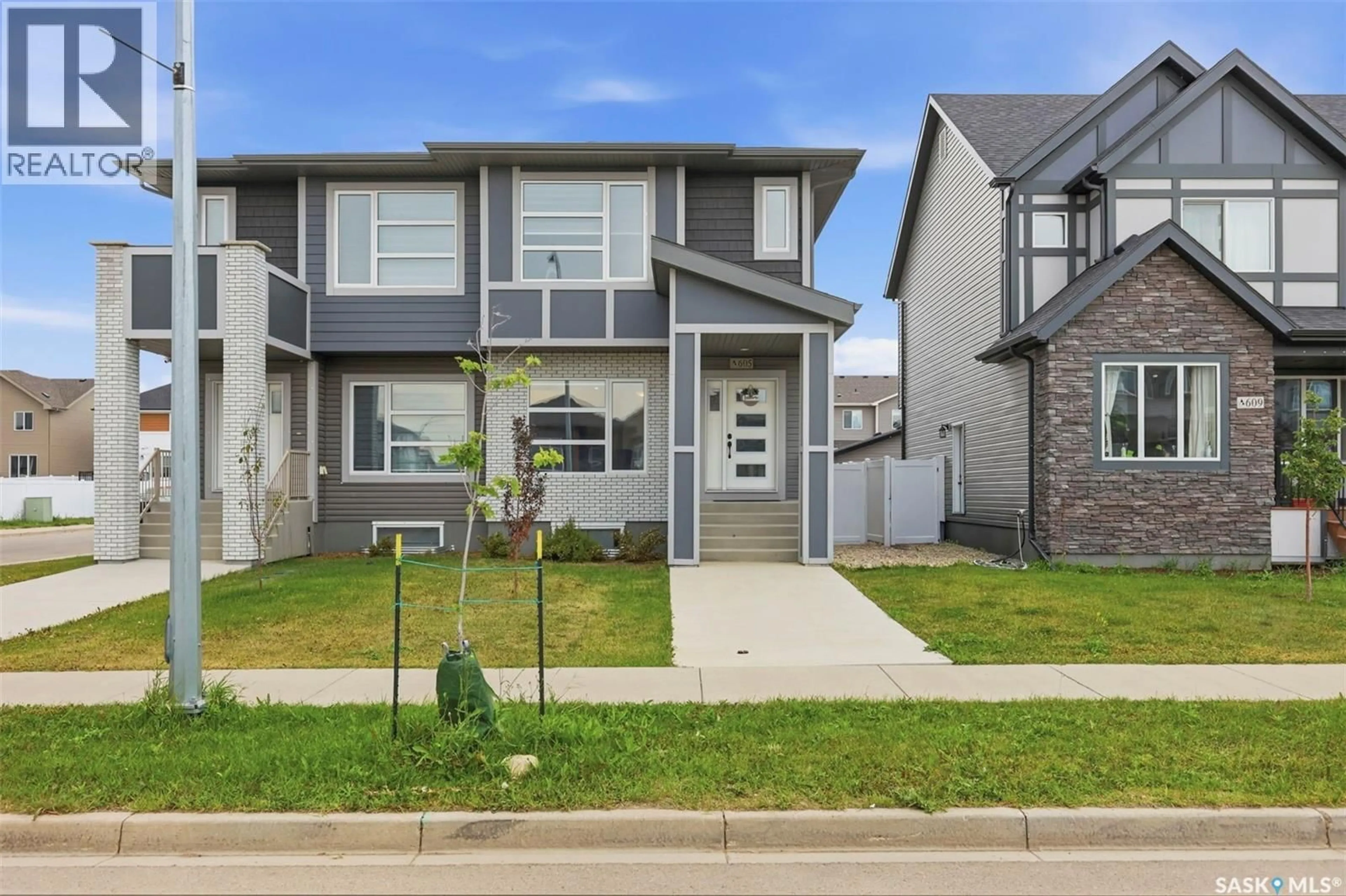 Home with vinyl exterior material, street for 605 FEHEREGYHAZI BOULEVARD, Saskatoon Saskatchewan S7W0Z4
