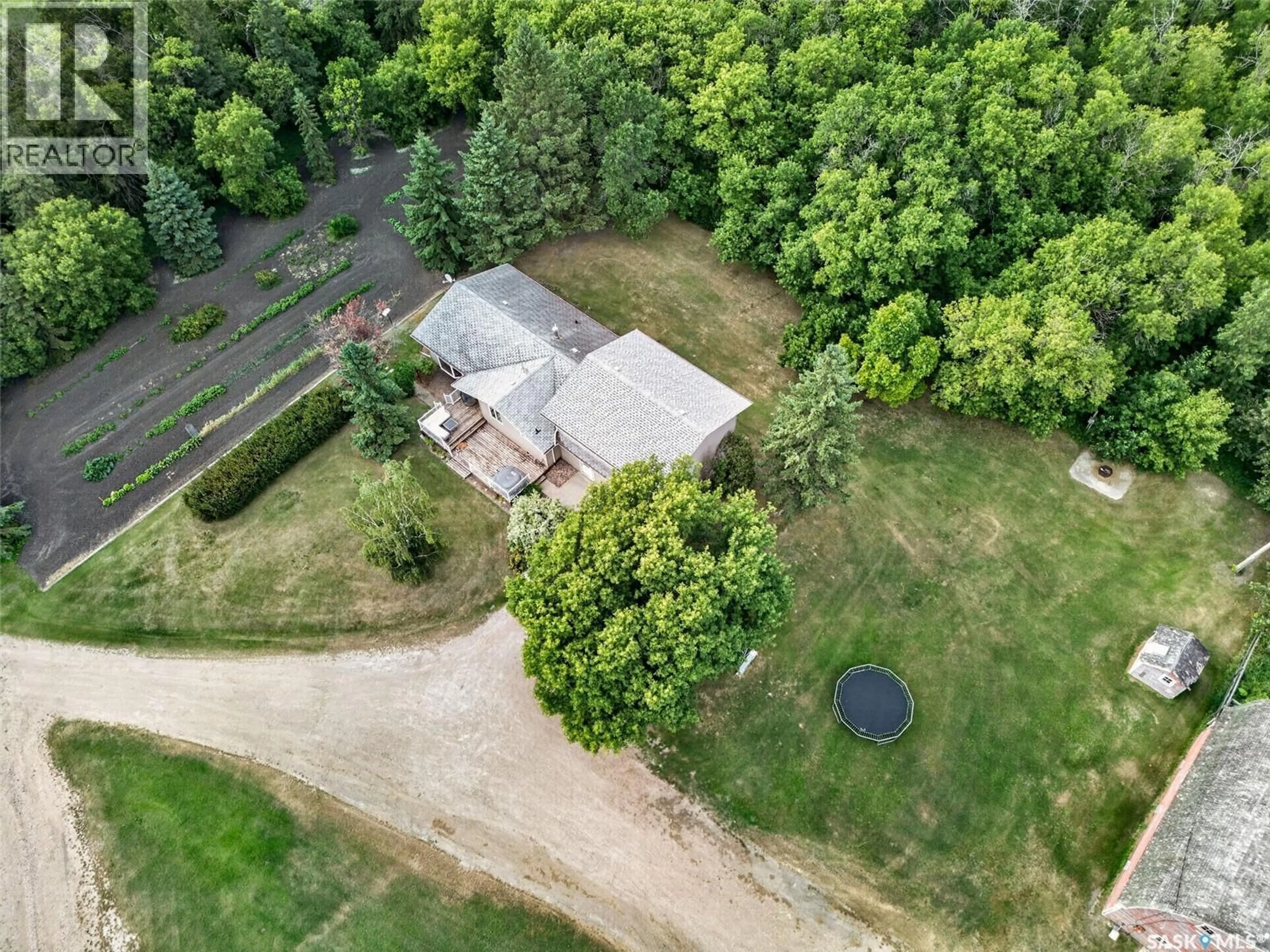 A pic from outside/outdoor area/front of a property/back of a property/a pic from drone, forest/trees view for ENGLEFELD ACREAGE, St. Peter RM No. 369 Saskatchewan S0K1N0