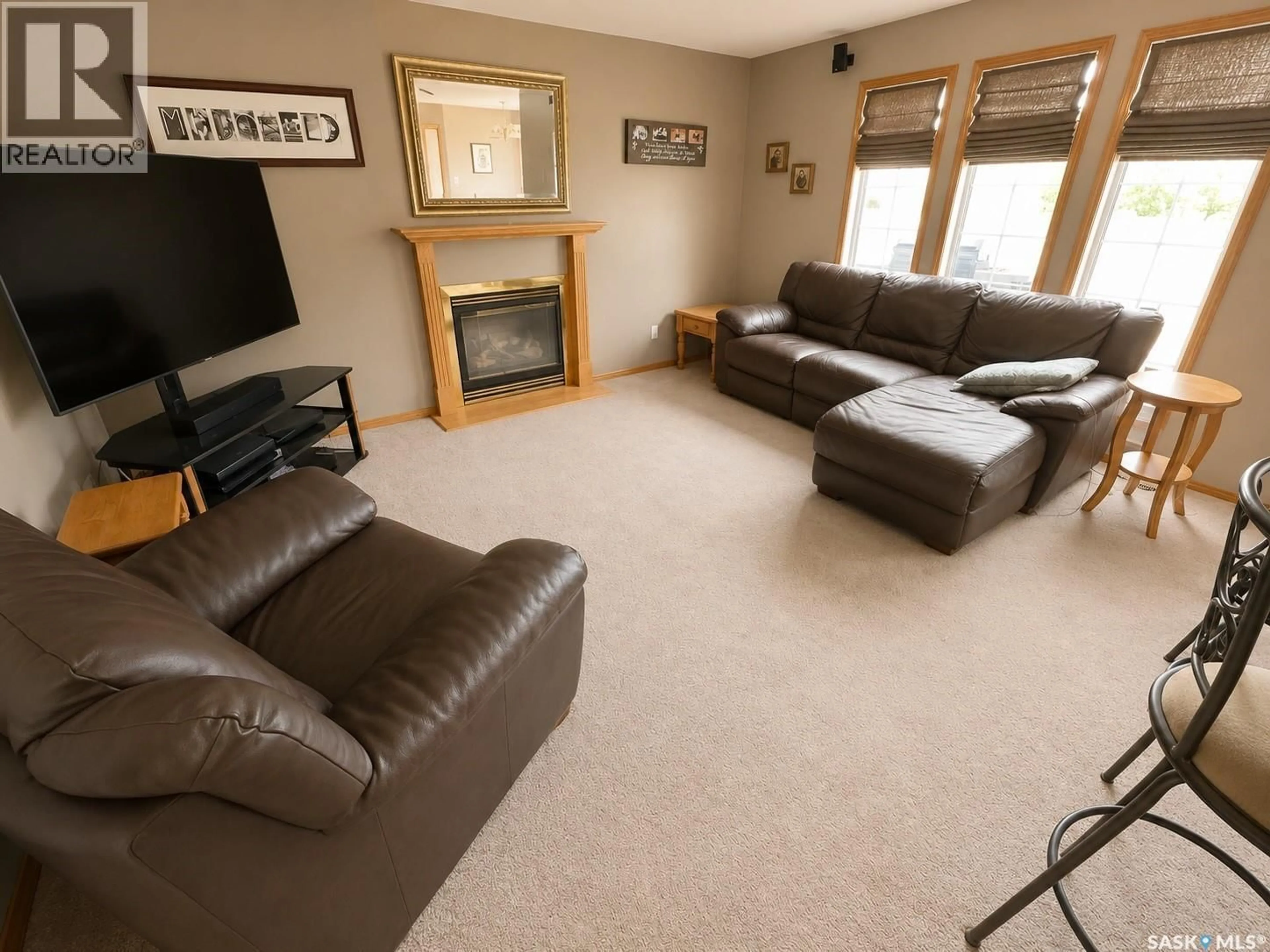 Living room with furniture, unknown for MCDONALD ACREAGE, Weyburn Rm No. 67 Saskatchewan S4H0A0