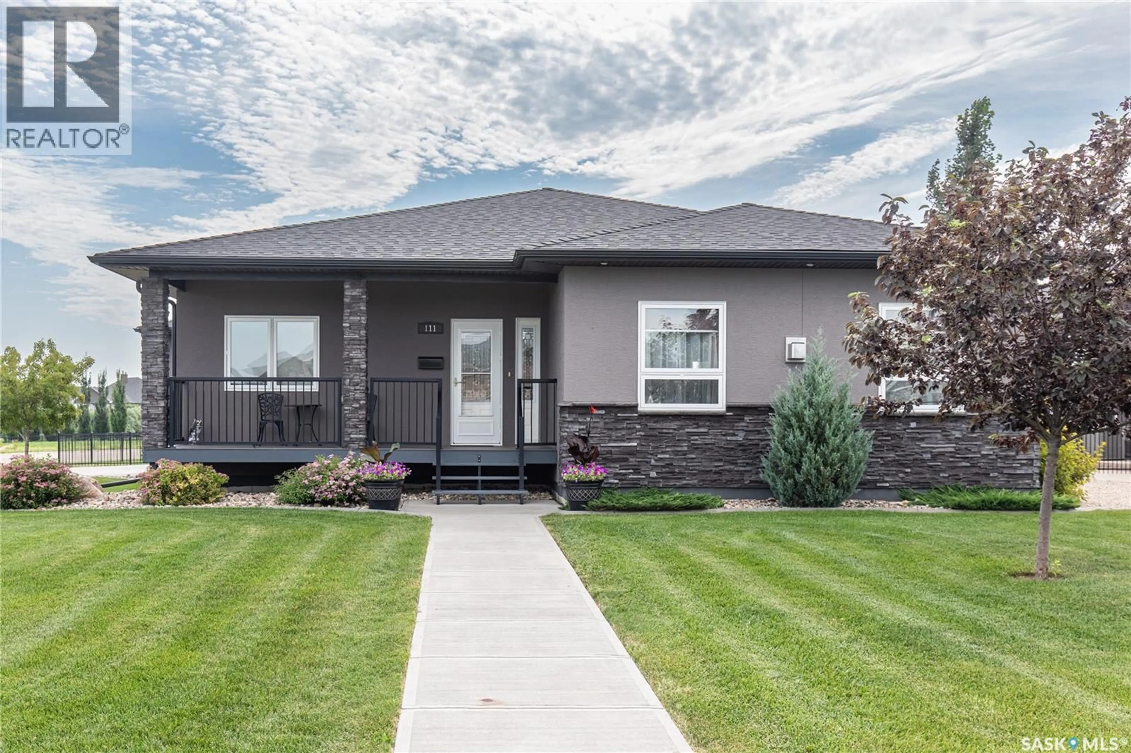 Home with vinyl exterior material, street for 111 IRON BRIDGE DRIVE, Moose Jaw Saskatchewan S6J0B4