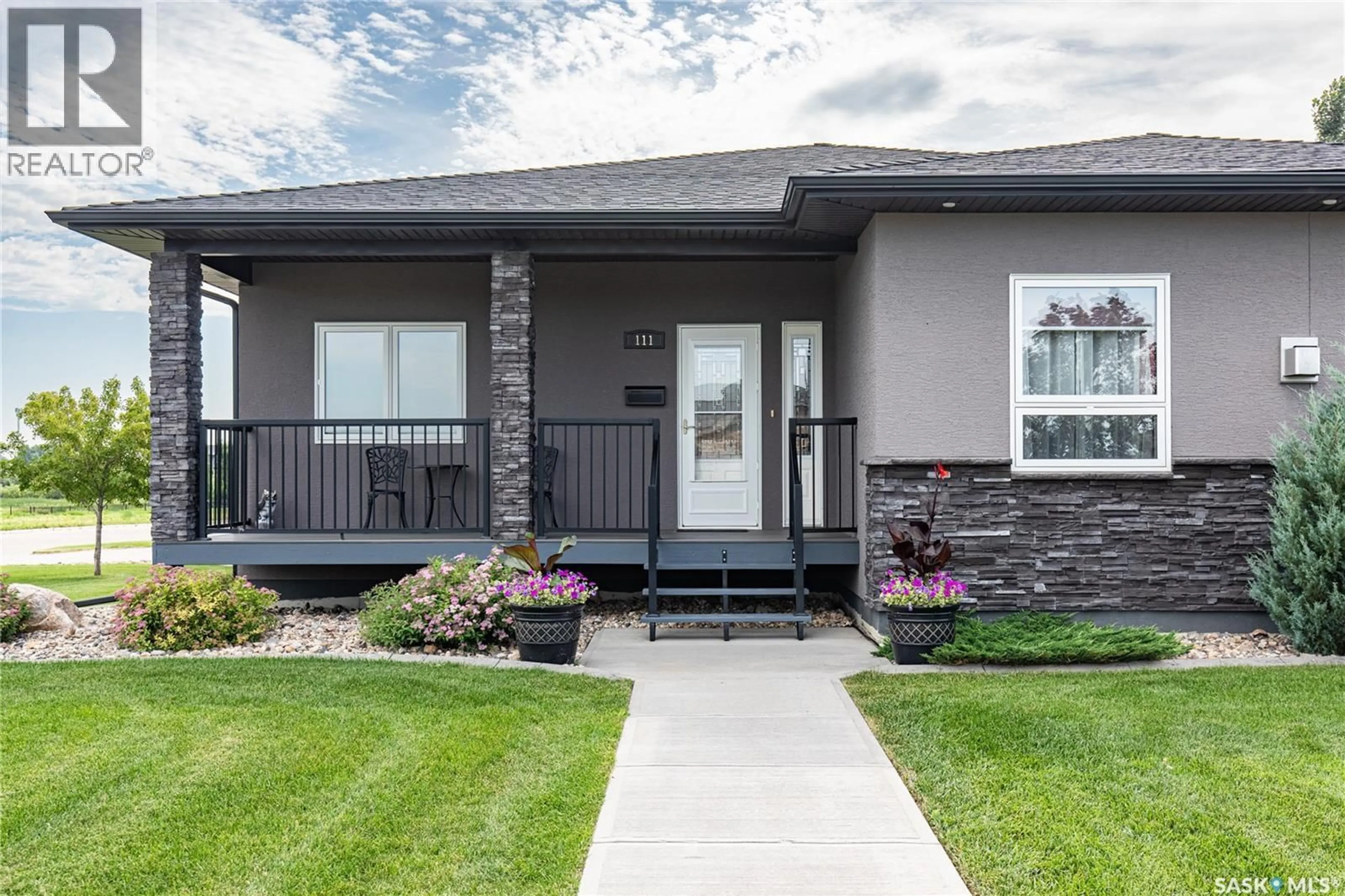Home with vinyl exterior material, street for 111 IRON BRIDGE DRIVE, Moose Jaw Saskatchewan S6J0B4