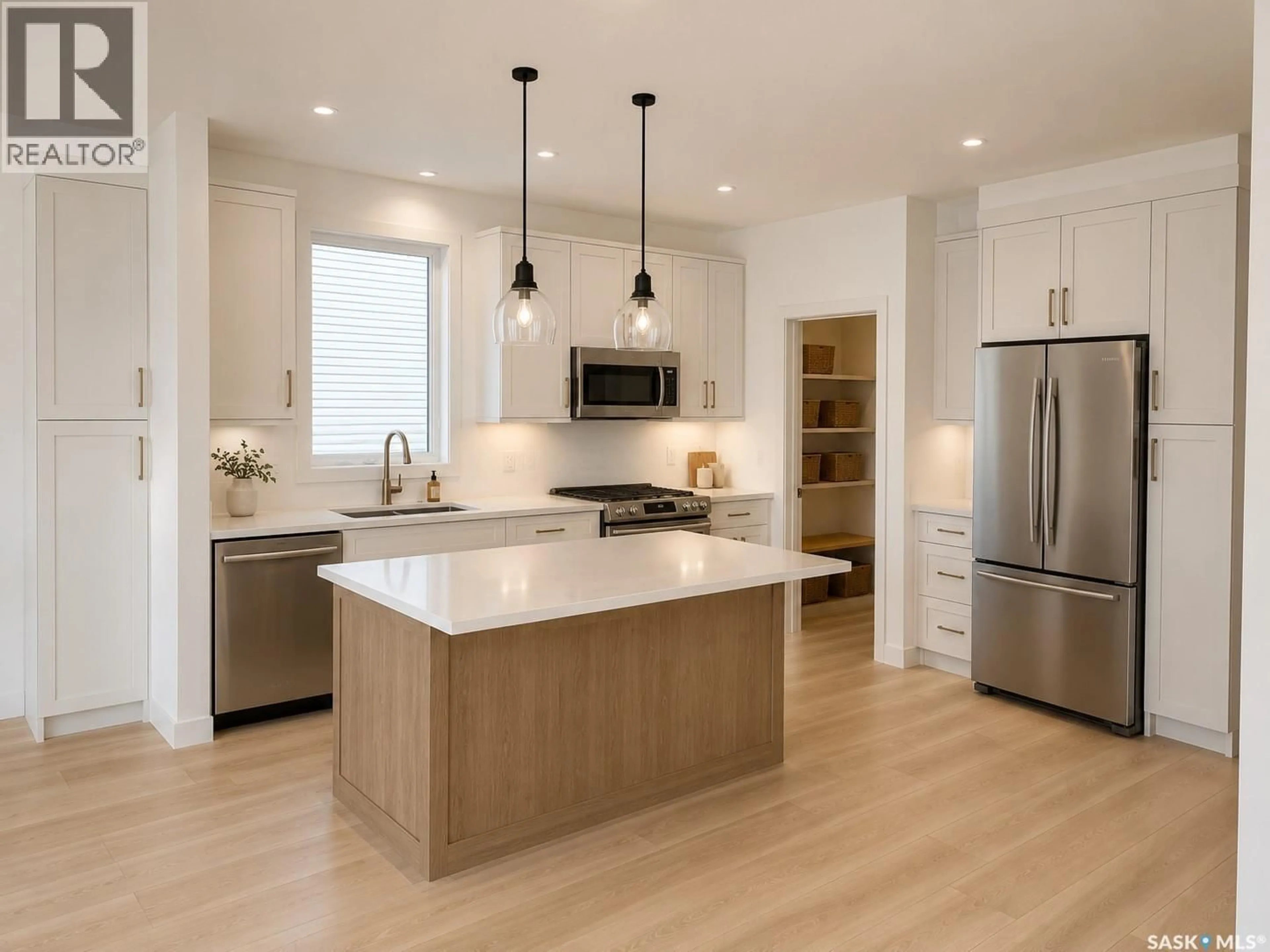 Open concept kitchen, wood/laminate floor for 310 NAZARALI AVENUE, Saskatoon Saskatchewan S7V1N6