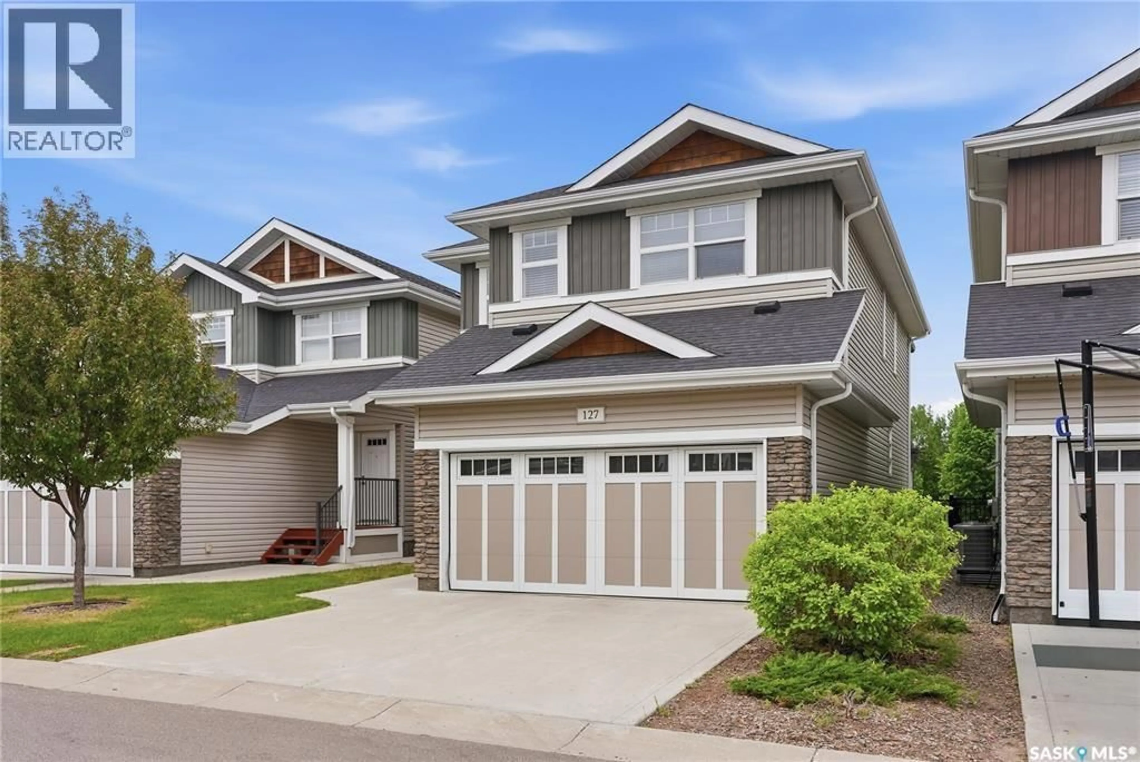 Home with vinyl exterior material, street for 315 - 127 DICKSON CRESCENT, Saskatoon Saskatchewan S7T0Z1