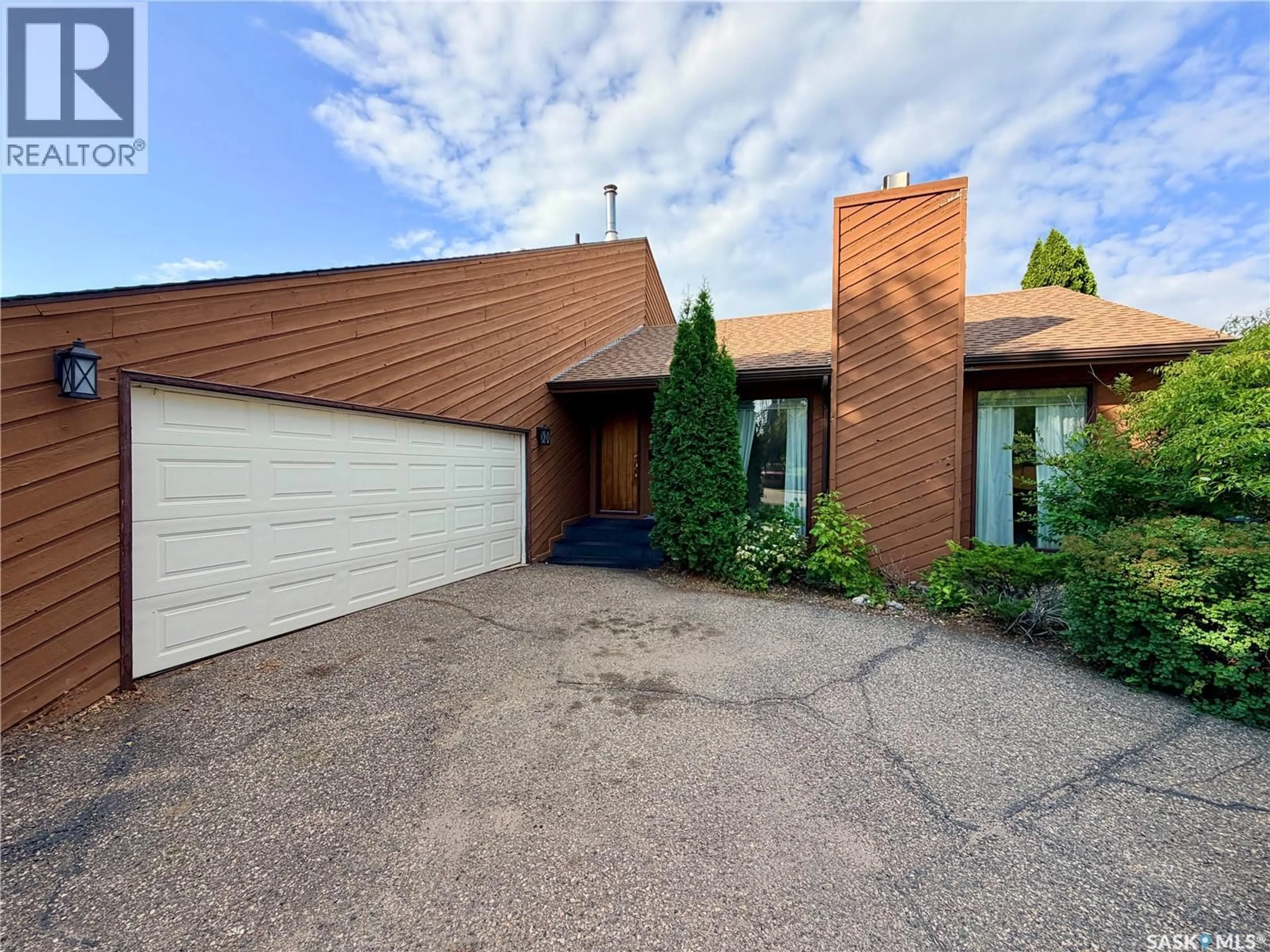 Home with brick exterior material, street for 2173 DOUGLAS AVENUE, North Battleford Saskatchewan S9A3N9