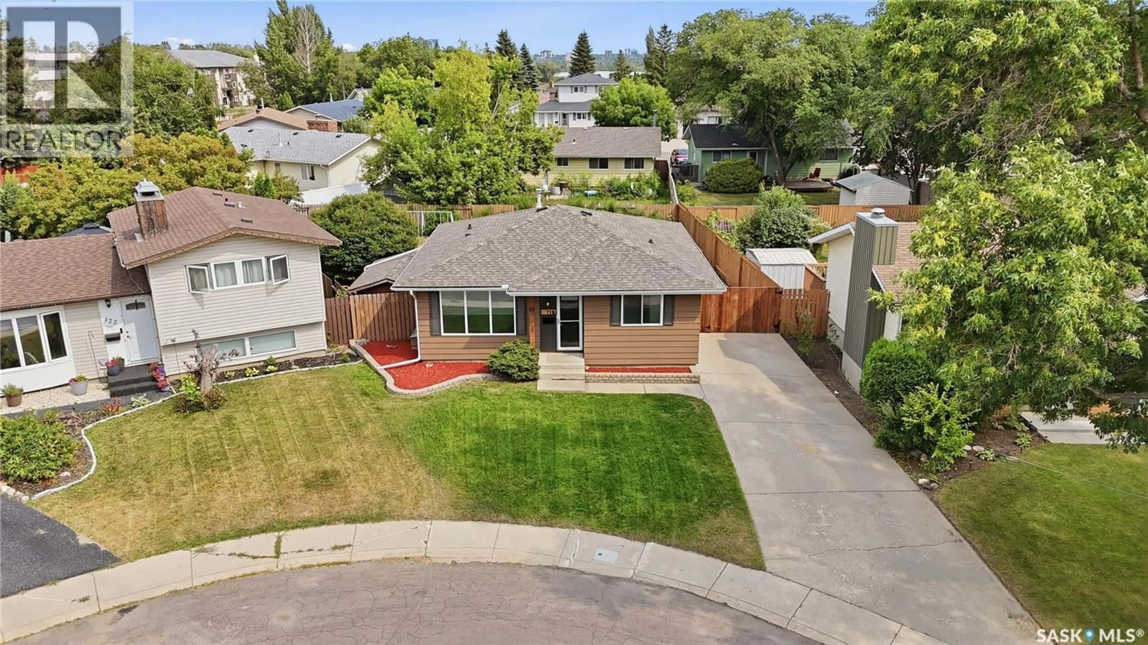A pic from outside/outdoor area/front of a property/back of a property/a pic from drone, street for 118 DUNDURN PLACE, Saskatoon Saskatchewan S7M4C3