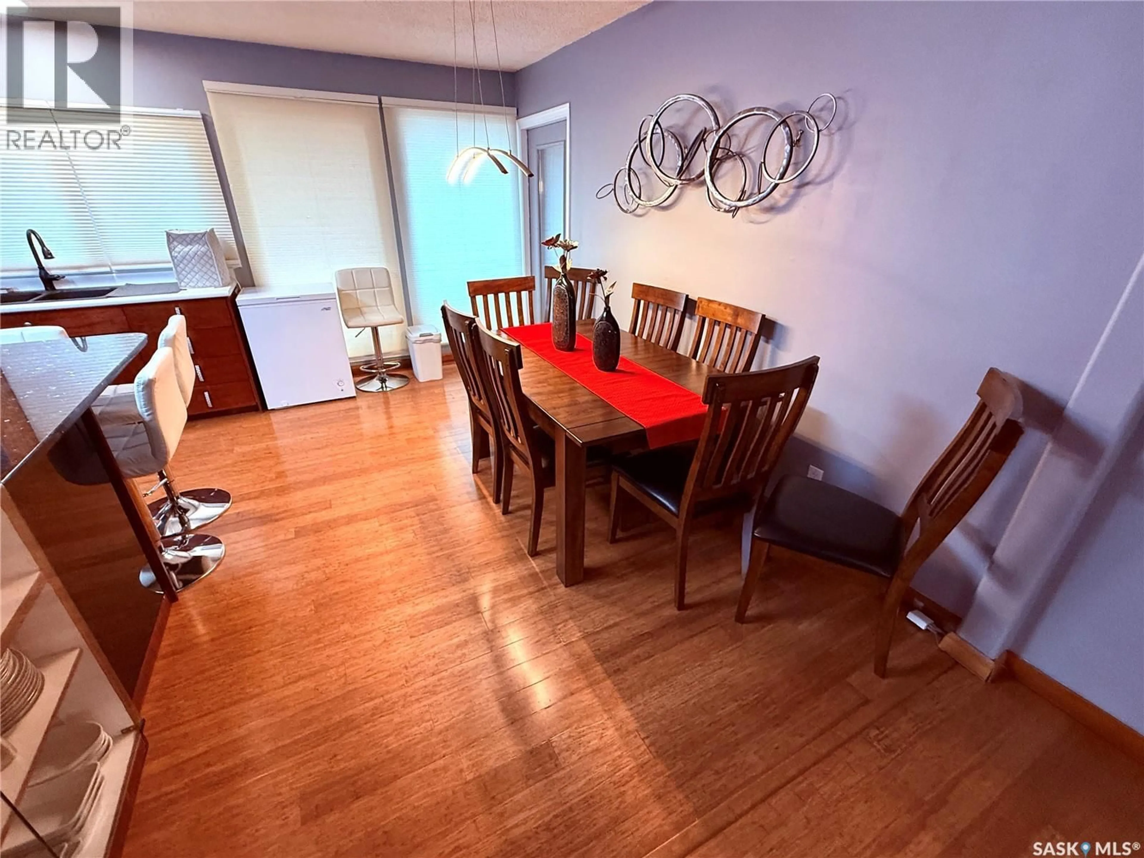 Dining room, wood/laminate floor for 502 101ST STREET, North Battleford Saskatchewan S9A0Y6