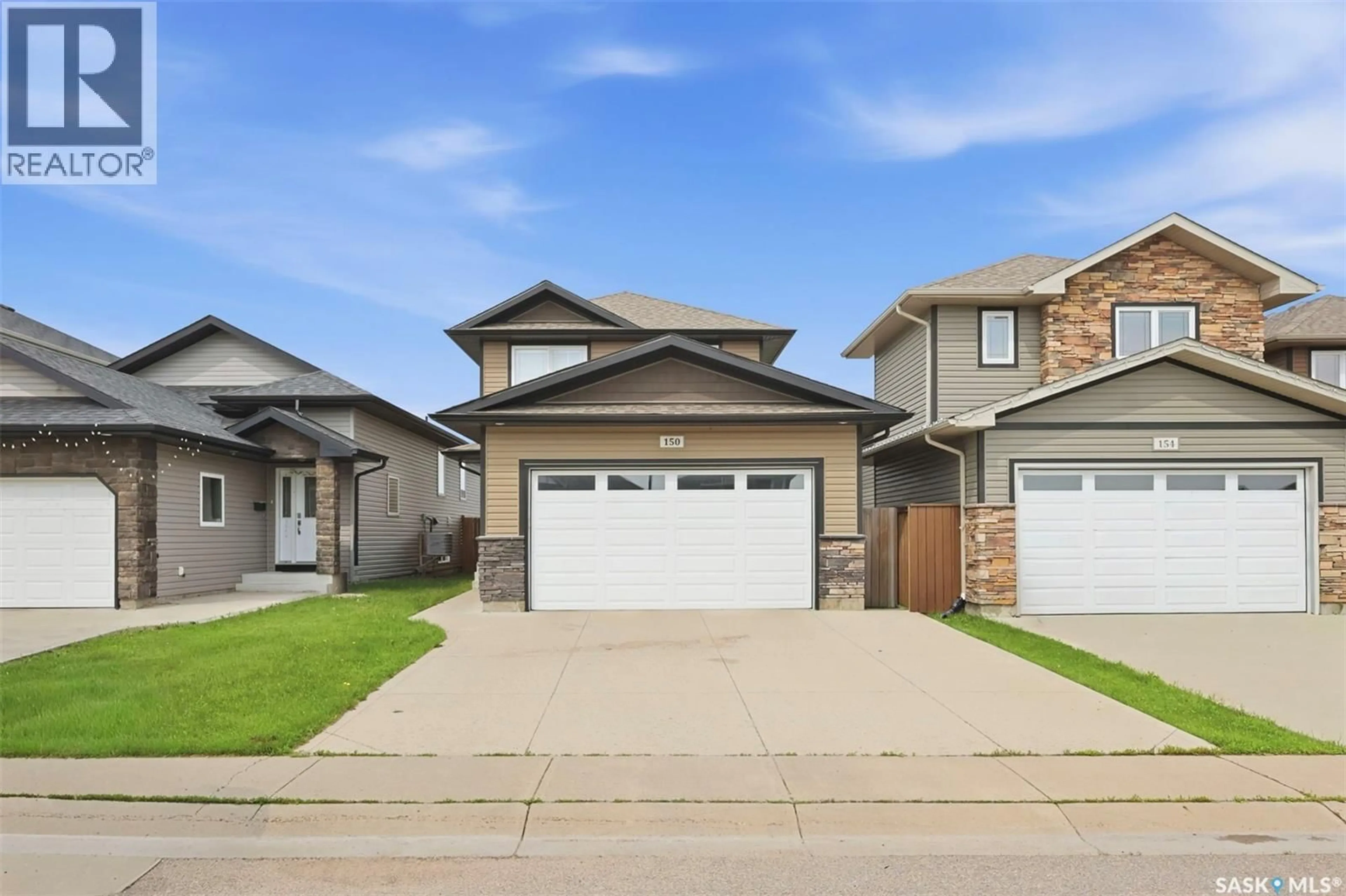 Home with vinyl exterior material, street for 150 HENICK CRESCENT, Saskatoon Saskatchewan S7R0J9