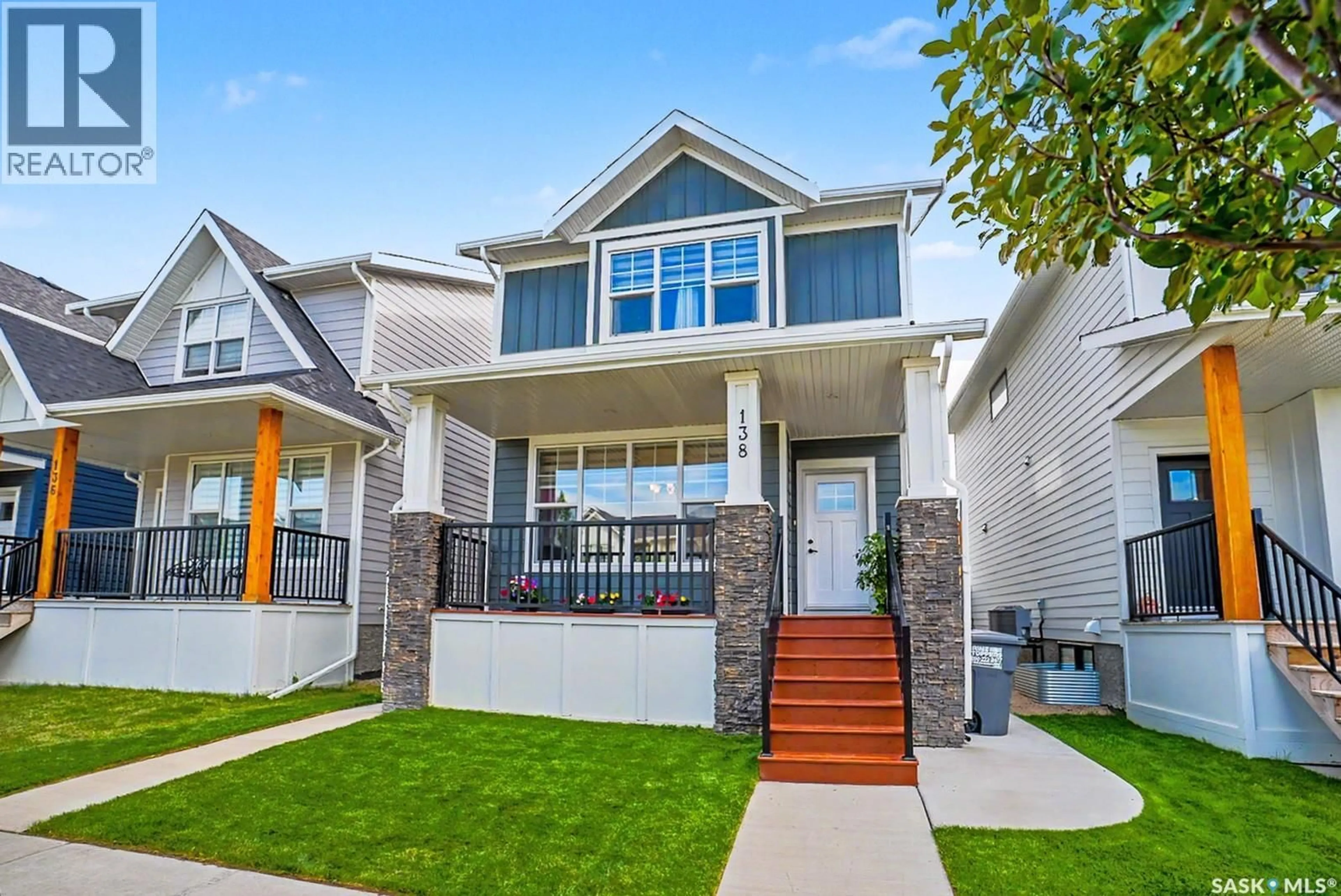 Home with vinyl exterior material, street for 138 ROSEWOOD BOULEVARD, Saskatoon Saskatchewan S7V0Y9