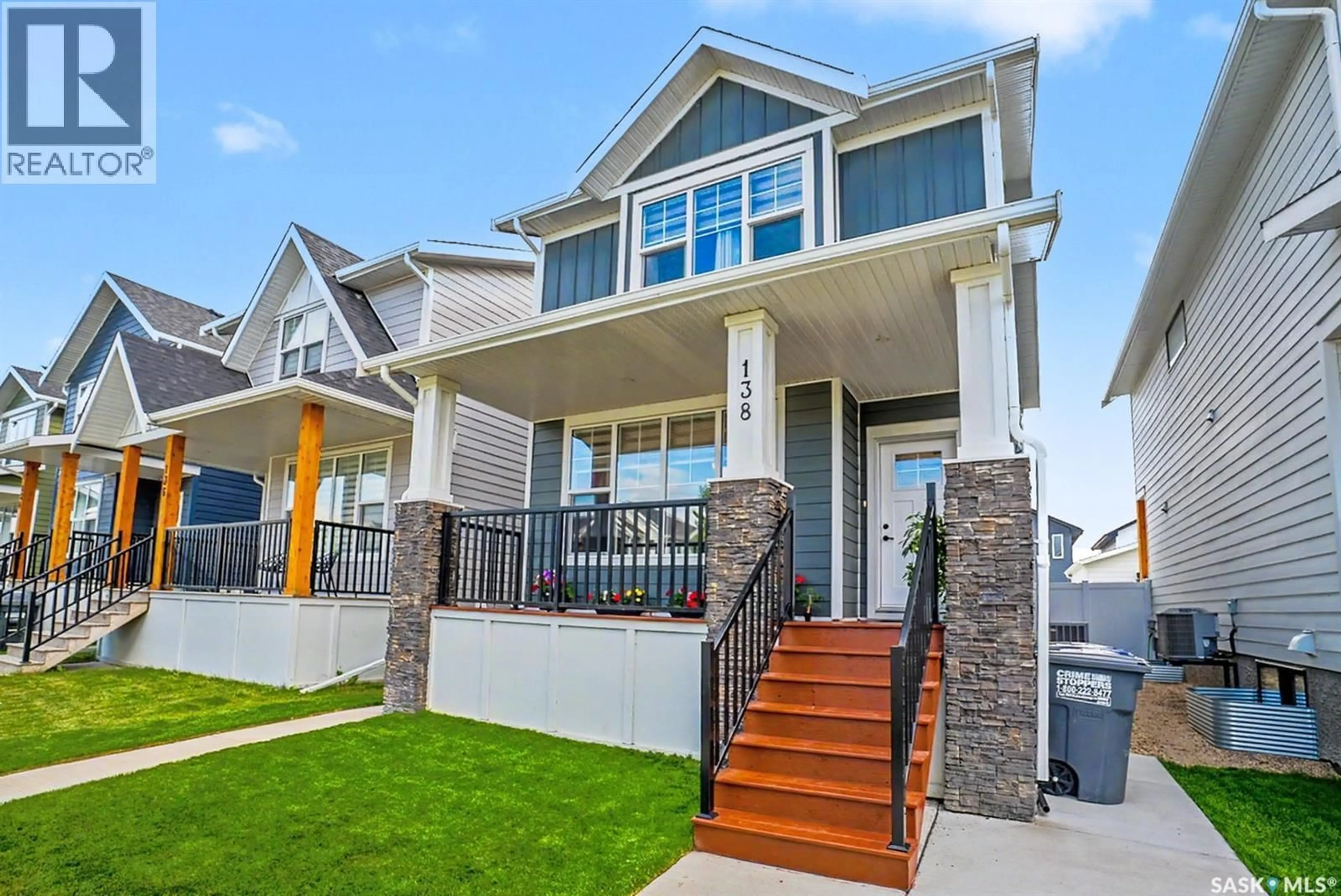 Home with vinyl exterior material, street for 138 ROSEWOOD BOULEVARD, Saskatoon Saskatchewan S7V0Y9