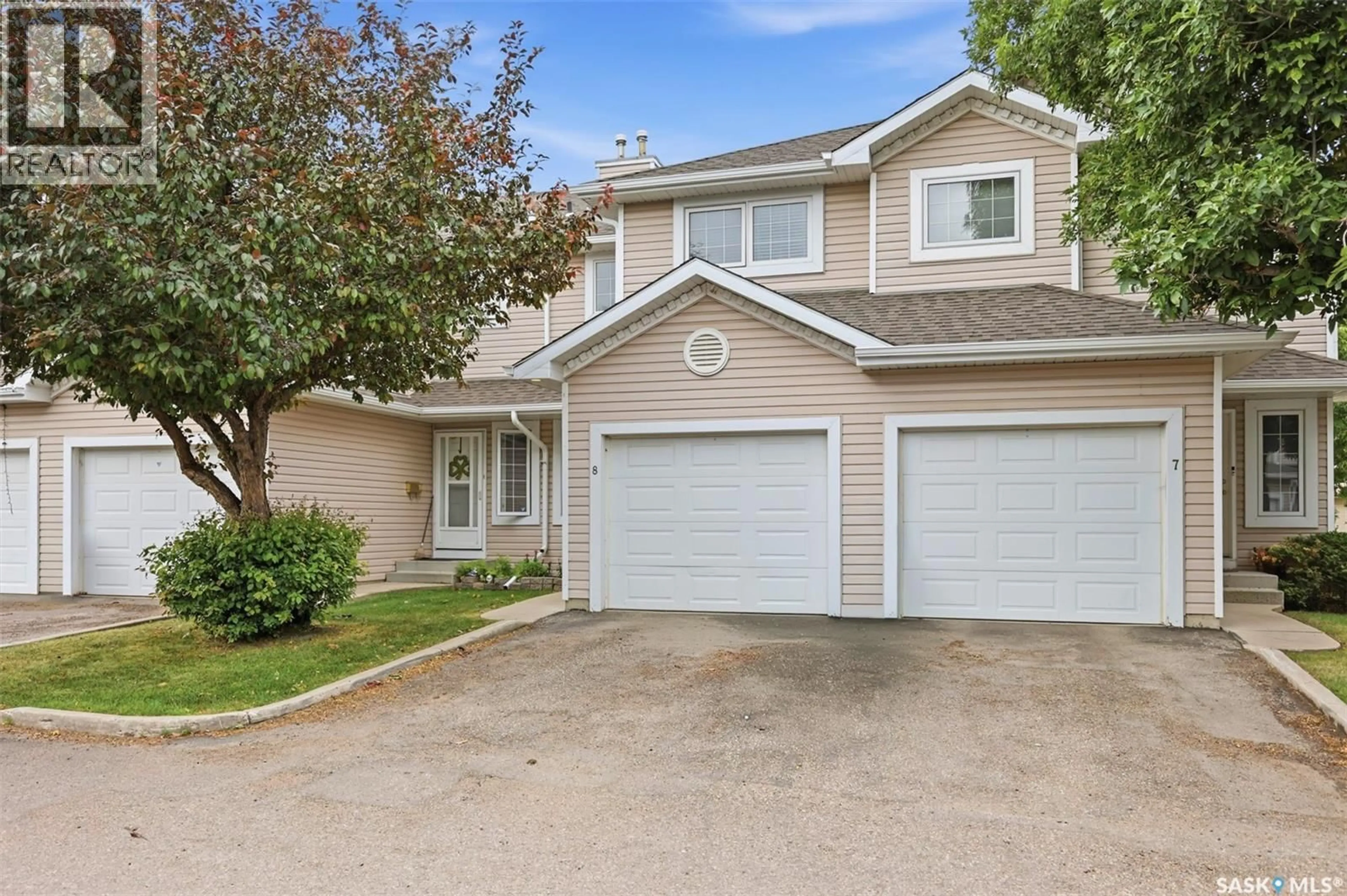 Home with vinyl exterior material, street for 103 - 8 BERINI DRIVE, Saskatoon Saskatchewan S7N4N2