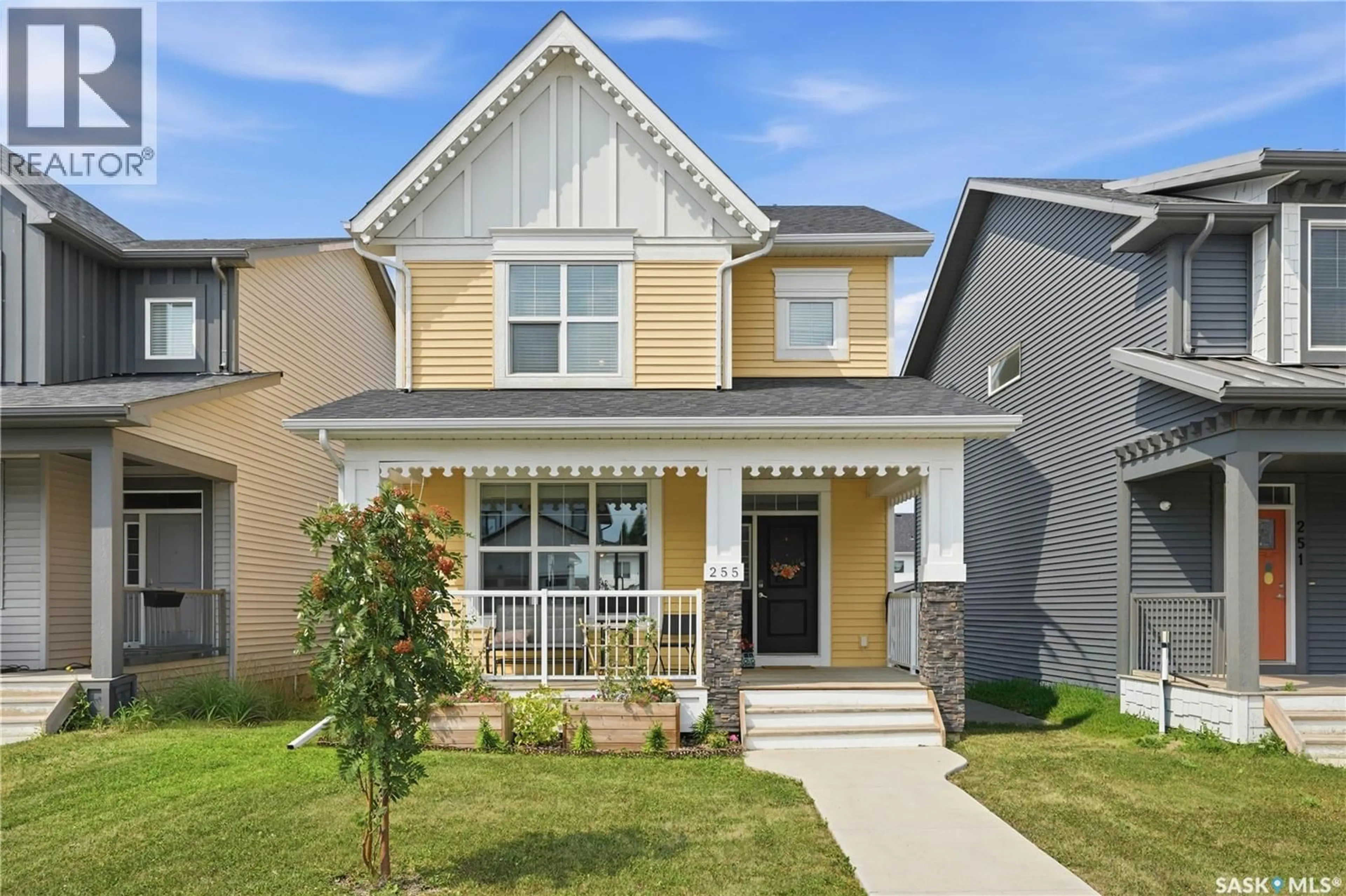 Home with vinyl exterior material, street for 255 NEWTON LINK, Saskatoon Saskatchewan S7V0M8