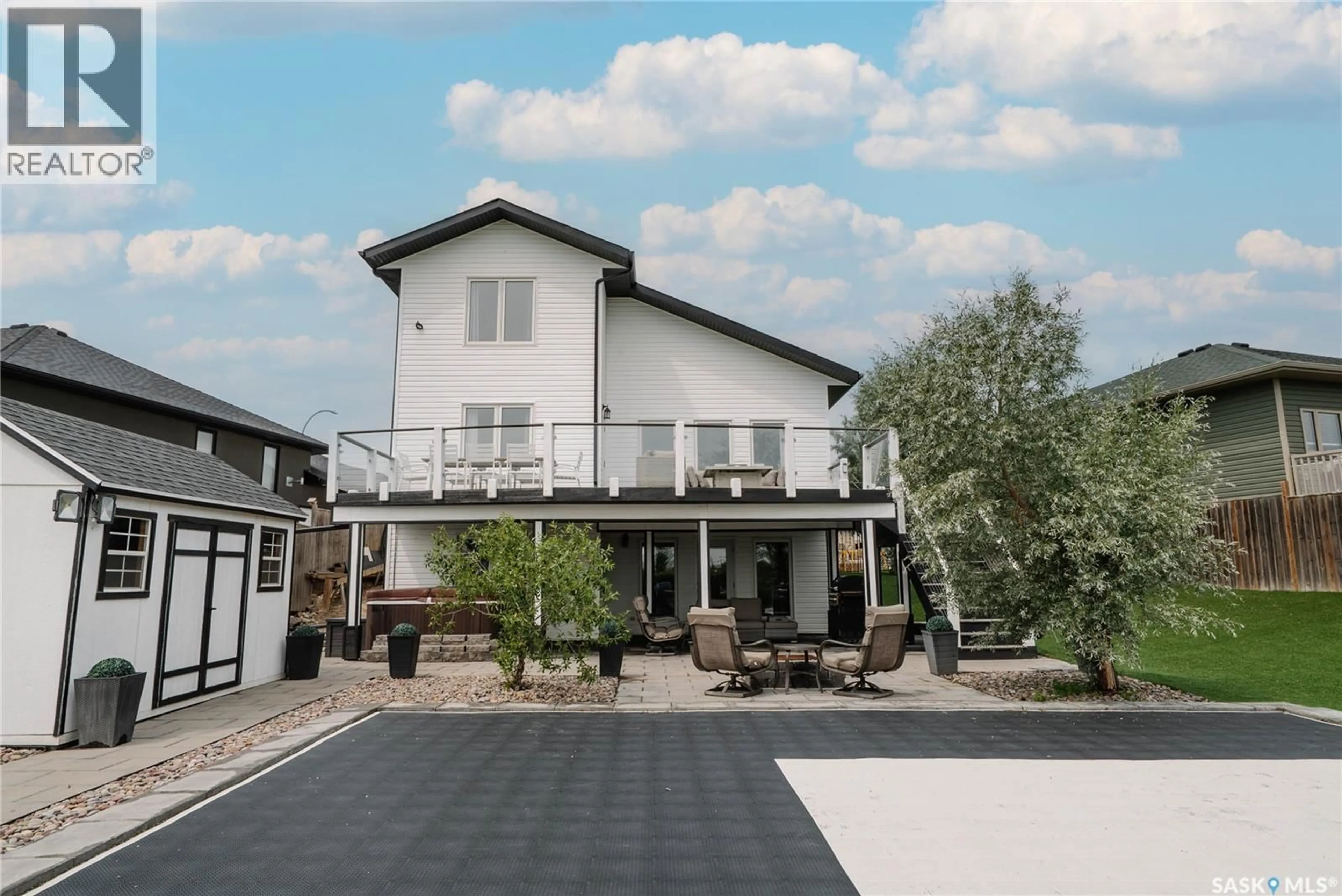 Home with vinyl exterior material, street for 400 STONE TERRACE, Martensville Saskatchewan S0K0A2