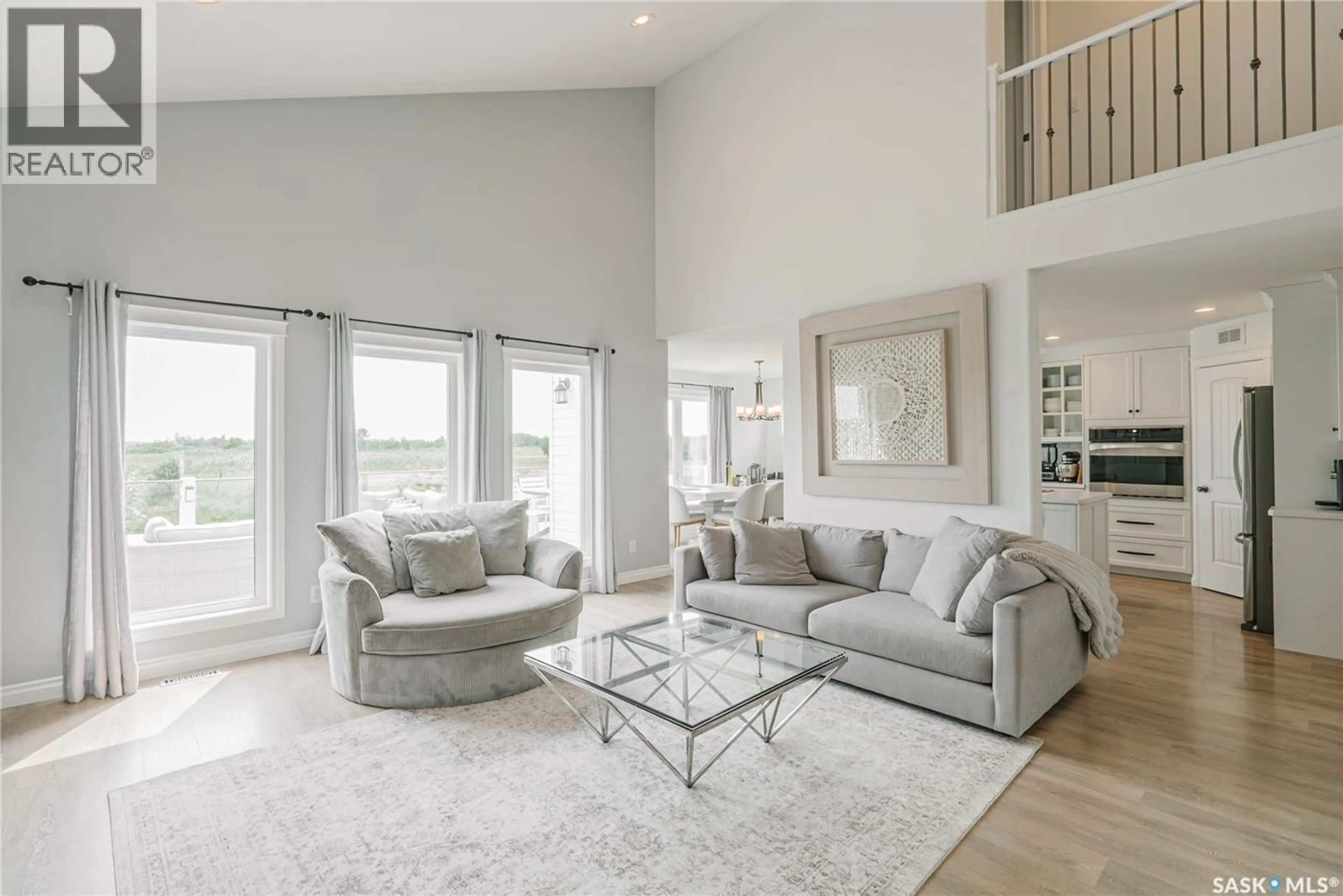 Living room with furniture, unknown for 400 STONE TERRACE, Martensville Saskatchewan S0K0A2