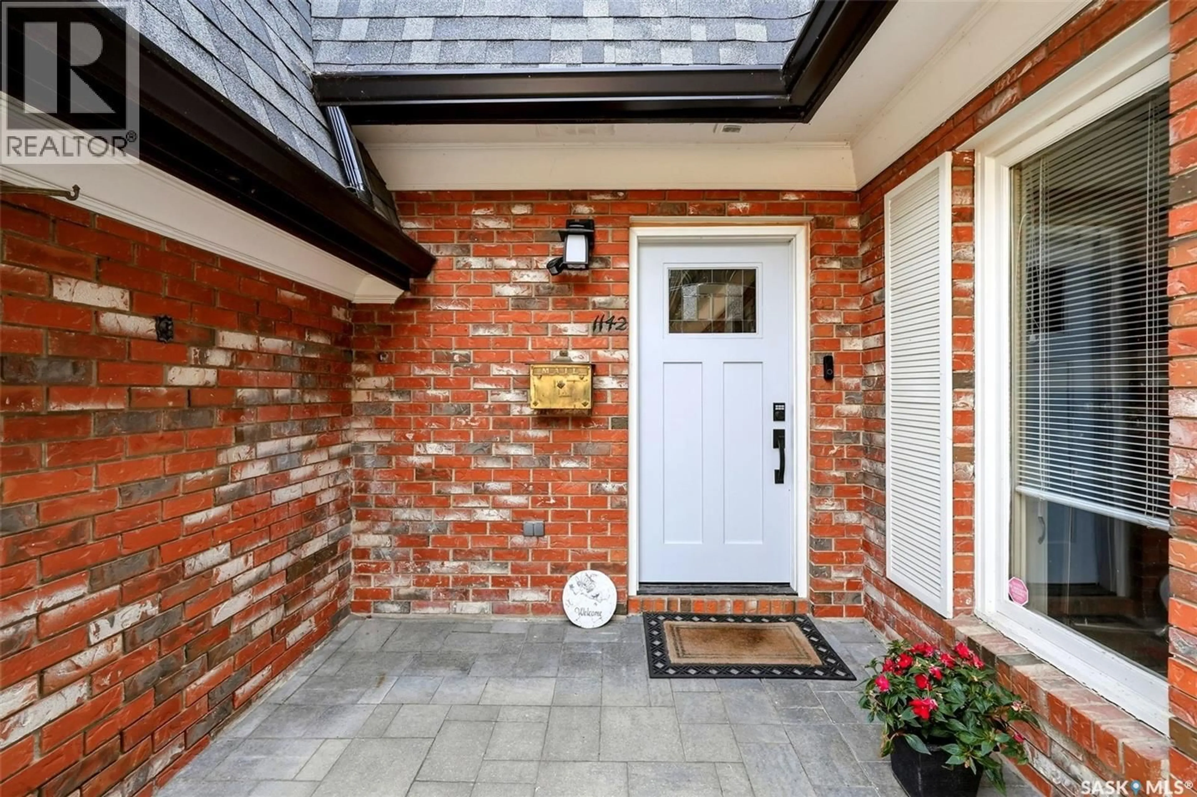 Home with brick exterior material, street for 1142 GRYPHONS WALK, Regina Saskatchewan S4S6X1