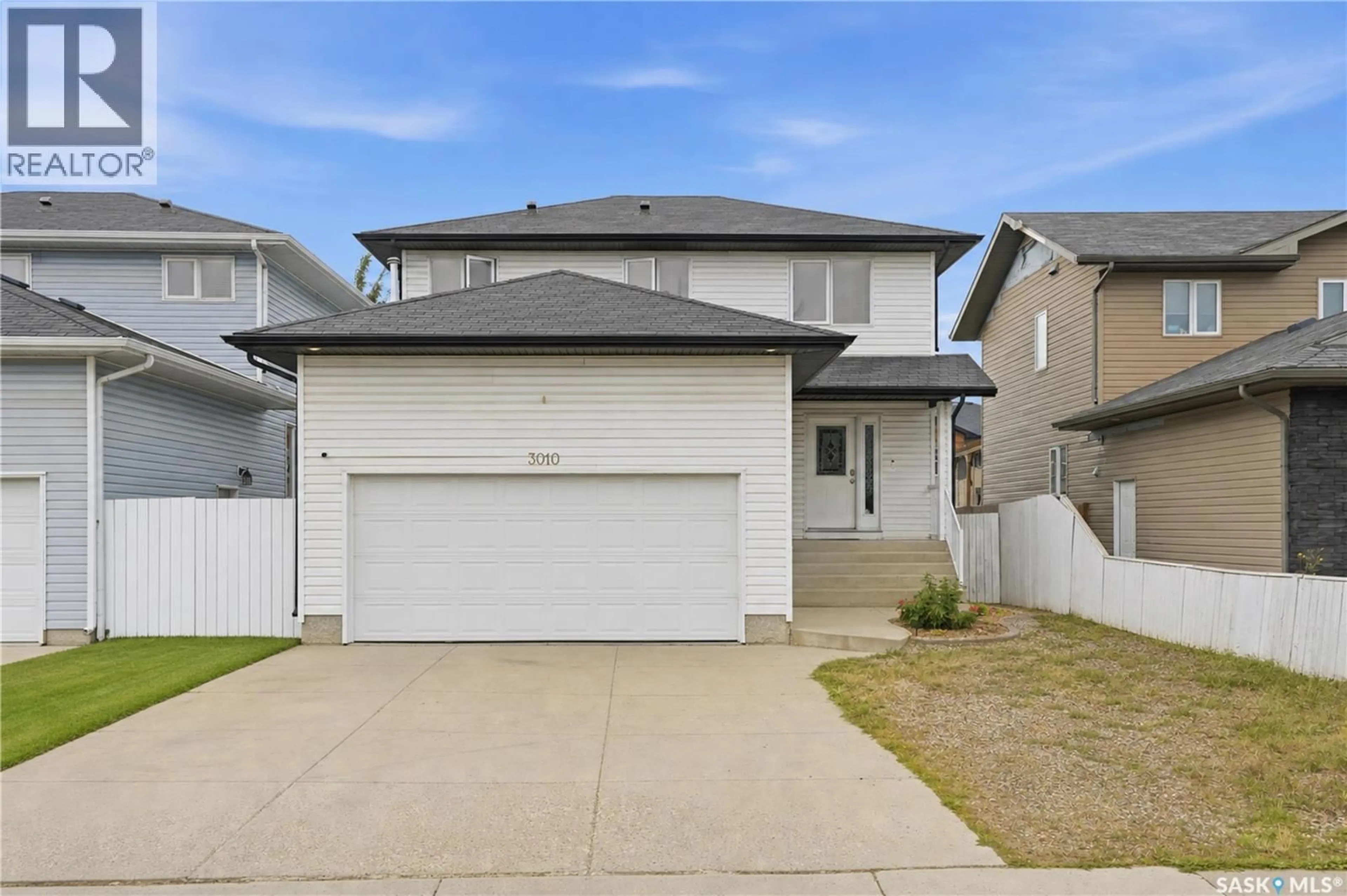 Home with vinyl exterior material, street for 3010 37TH STREET, Saskatoon Saskatchewan S7L7H9