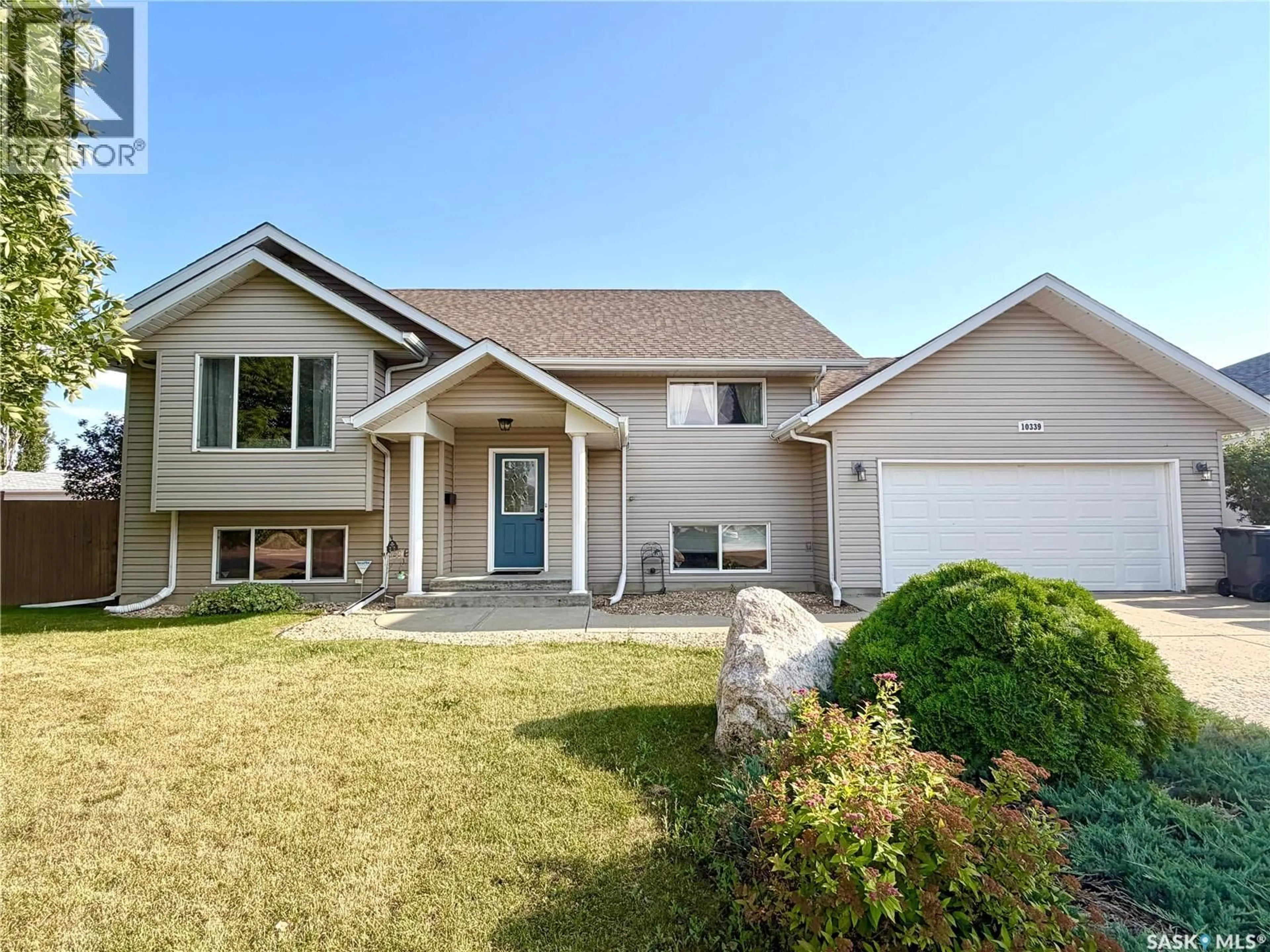 Home with vinyl exterior material, street for 10339 BUNCE CRESCENT, North Battleford Saskatchewan S9A3Y4