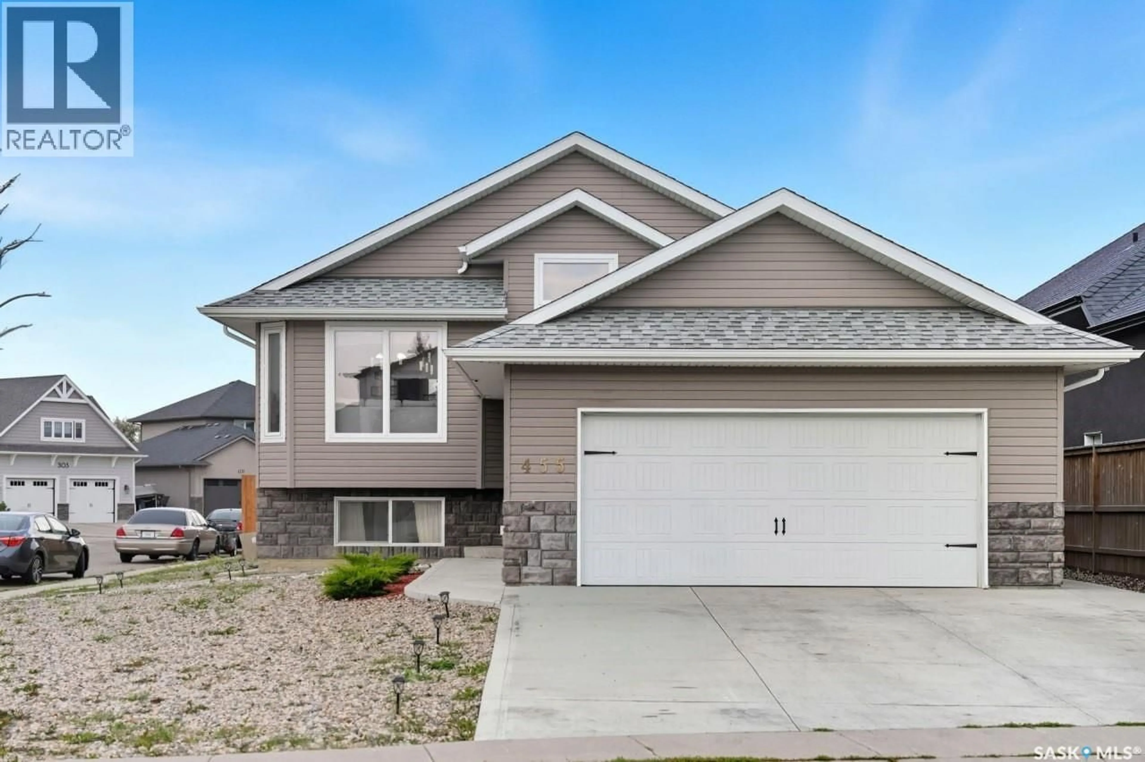 Home with vinyl exterior material, street for 455 HASTINGS CRESCENT, Saskatoon Saskatchewan S7V0C8