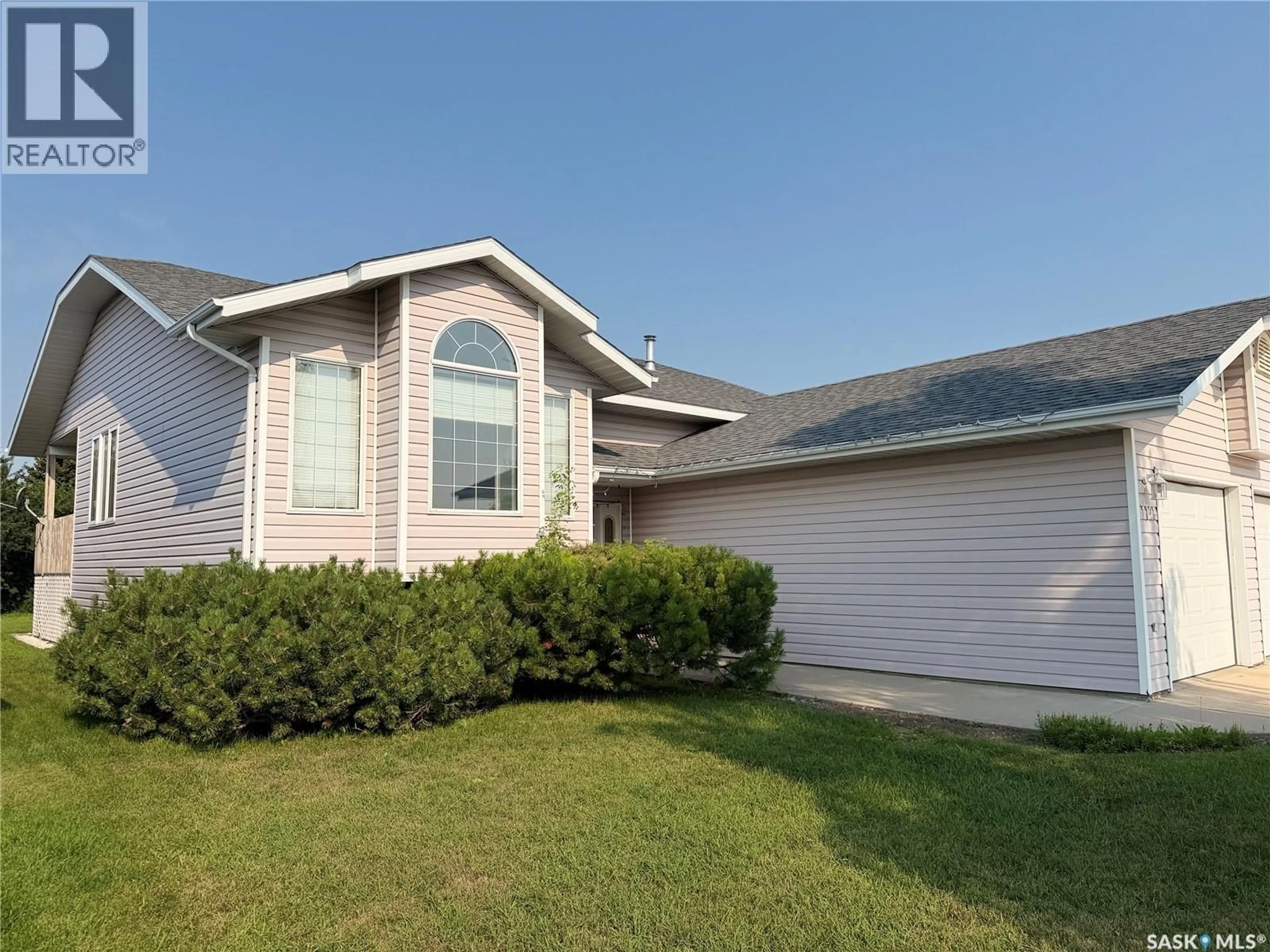Home with vinyl exterior material, street for 1121 21ST STREET, Humboldt Saskatchewan S0K2A0