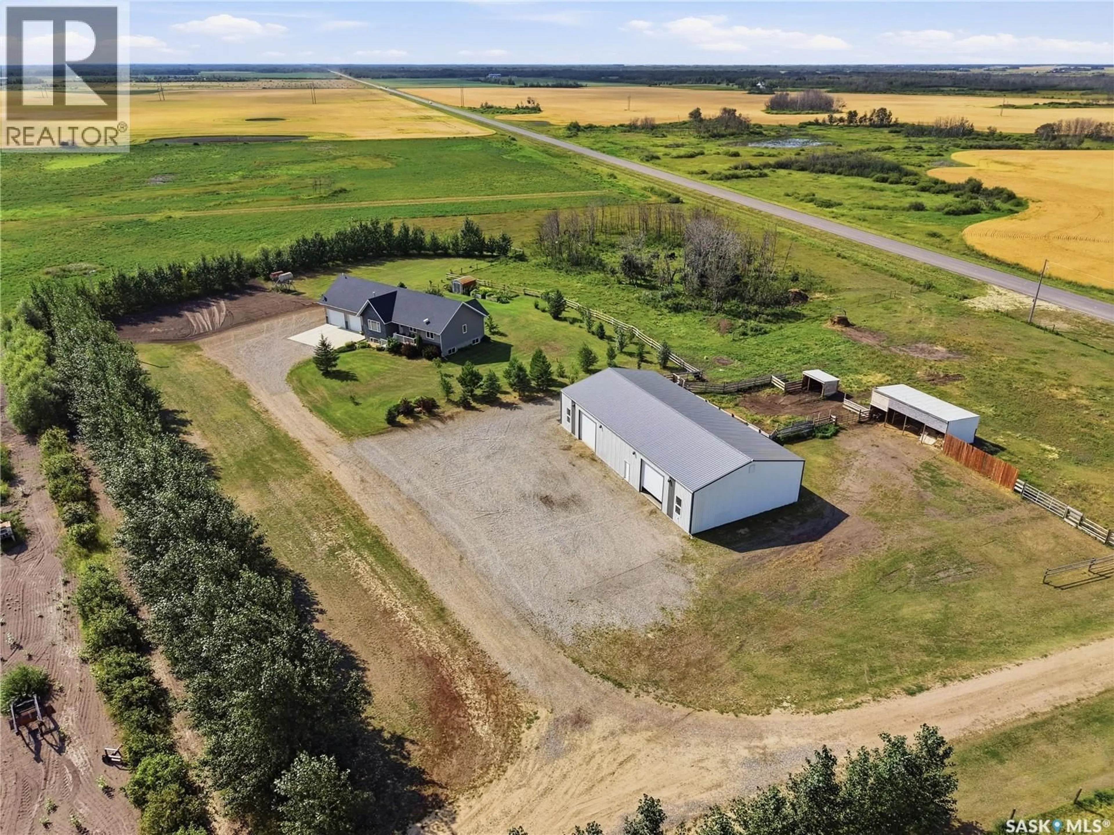 A pic from outside/outdoor area/front of a property/back of a property/a pic from drone, building for 374 TWP RD, Corman Park Rm No. 344 Saskatchewan S7K3J5