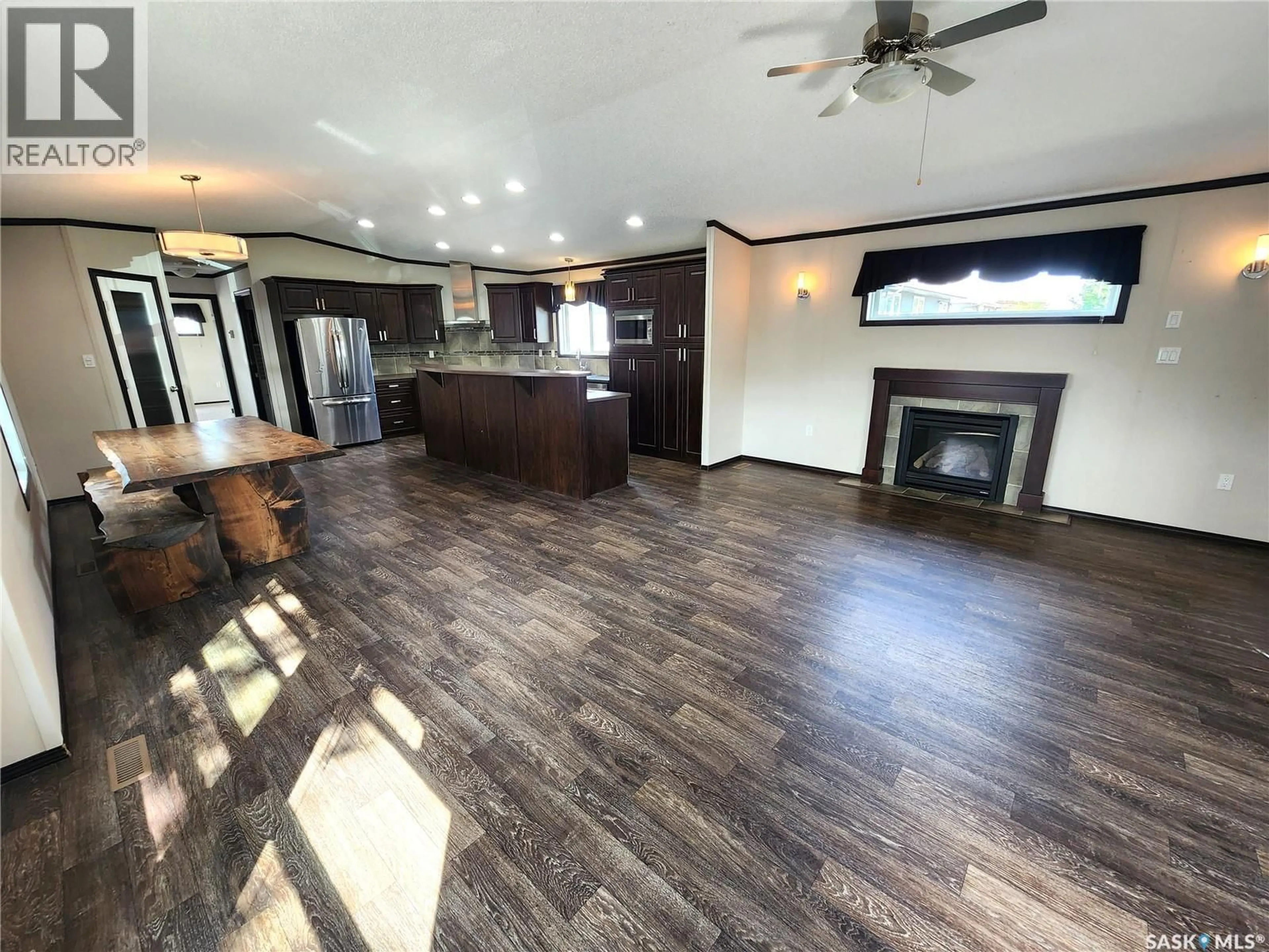 Open concept kitchen, wood/laminate floor for 417 YOUNG STREET, Bienfait Saskatchewan S0C0M0