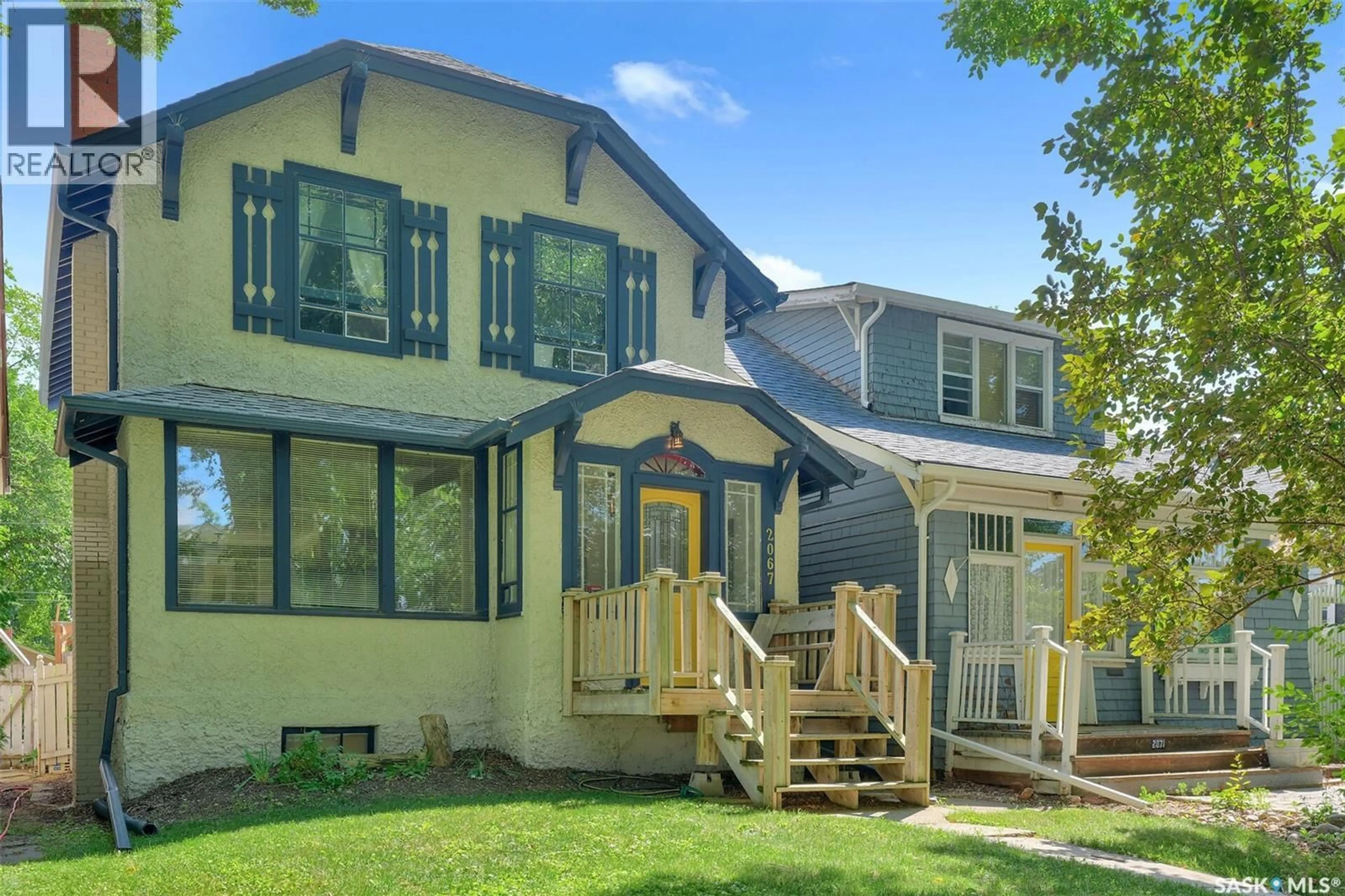 Home with vinyl exterior material, street for 2067 MONTAGUE STREET, Regina Saskatchewan S4T3J7