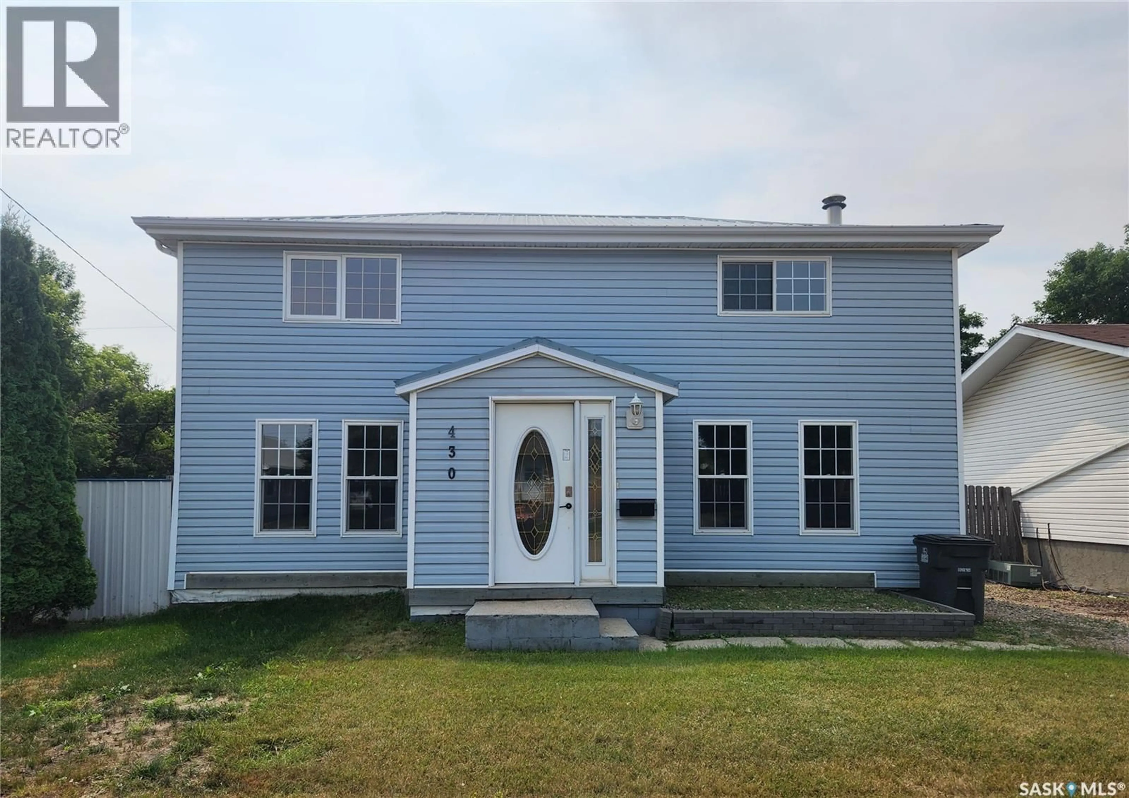Home with vinyl exterior material, building for 430 3RD STREET, Estevan Saskatchewan S4A0P2