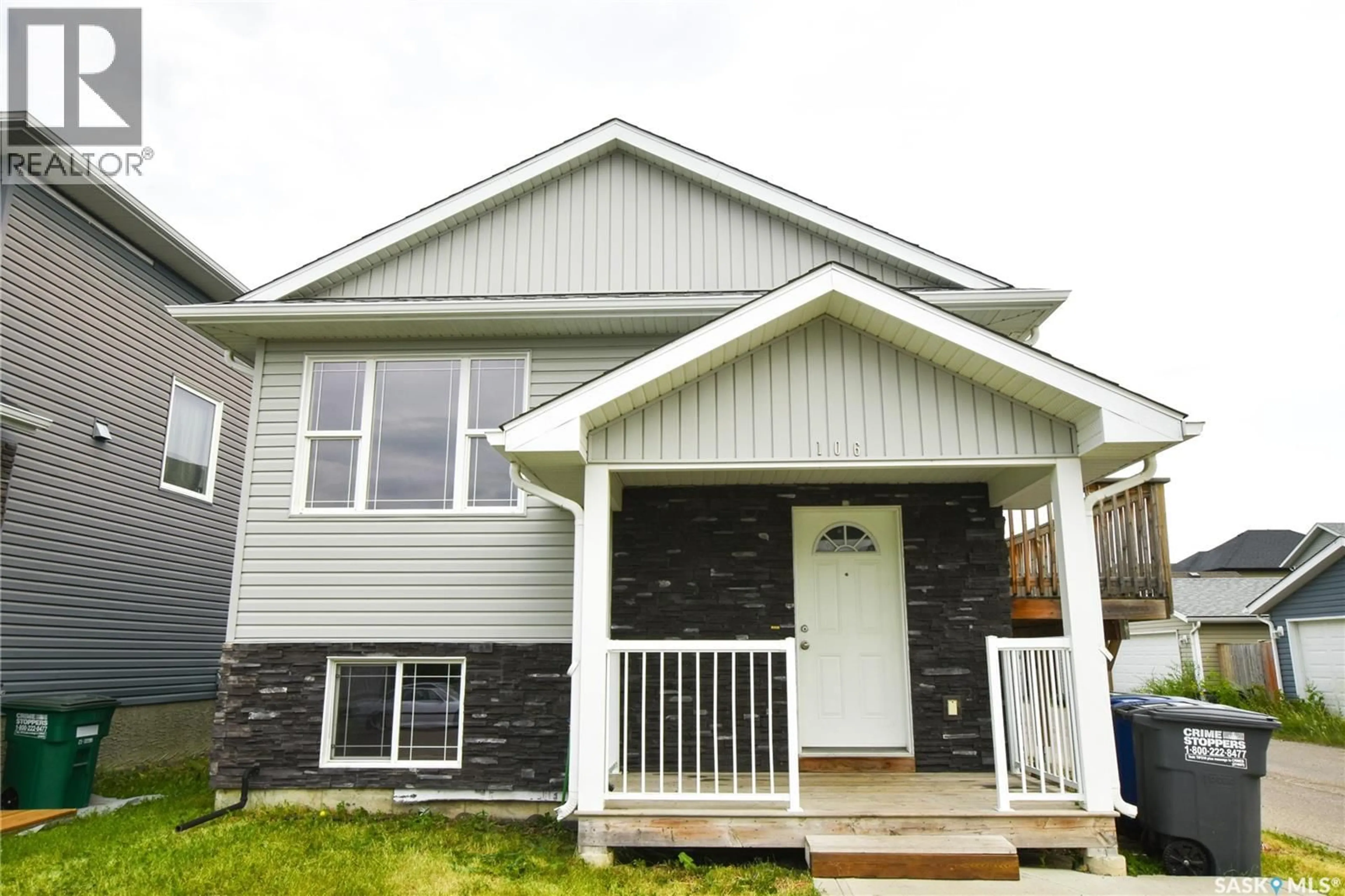 Home with vinyl exterior material, street for 106 GEARY CRESCENT, Saskatoon Saskatchewan S7R0B8