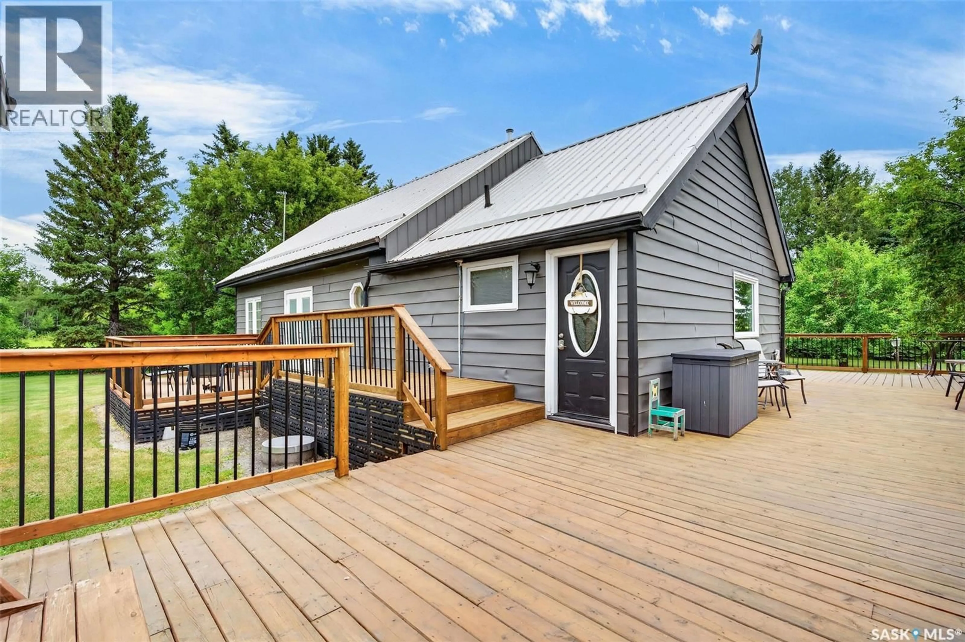 Home with vinyl exterior material, street for FIELDER ACREAGE, Spalding Rm No. 368 Saskatchewan S0K4C0