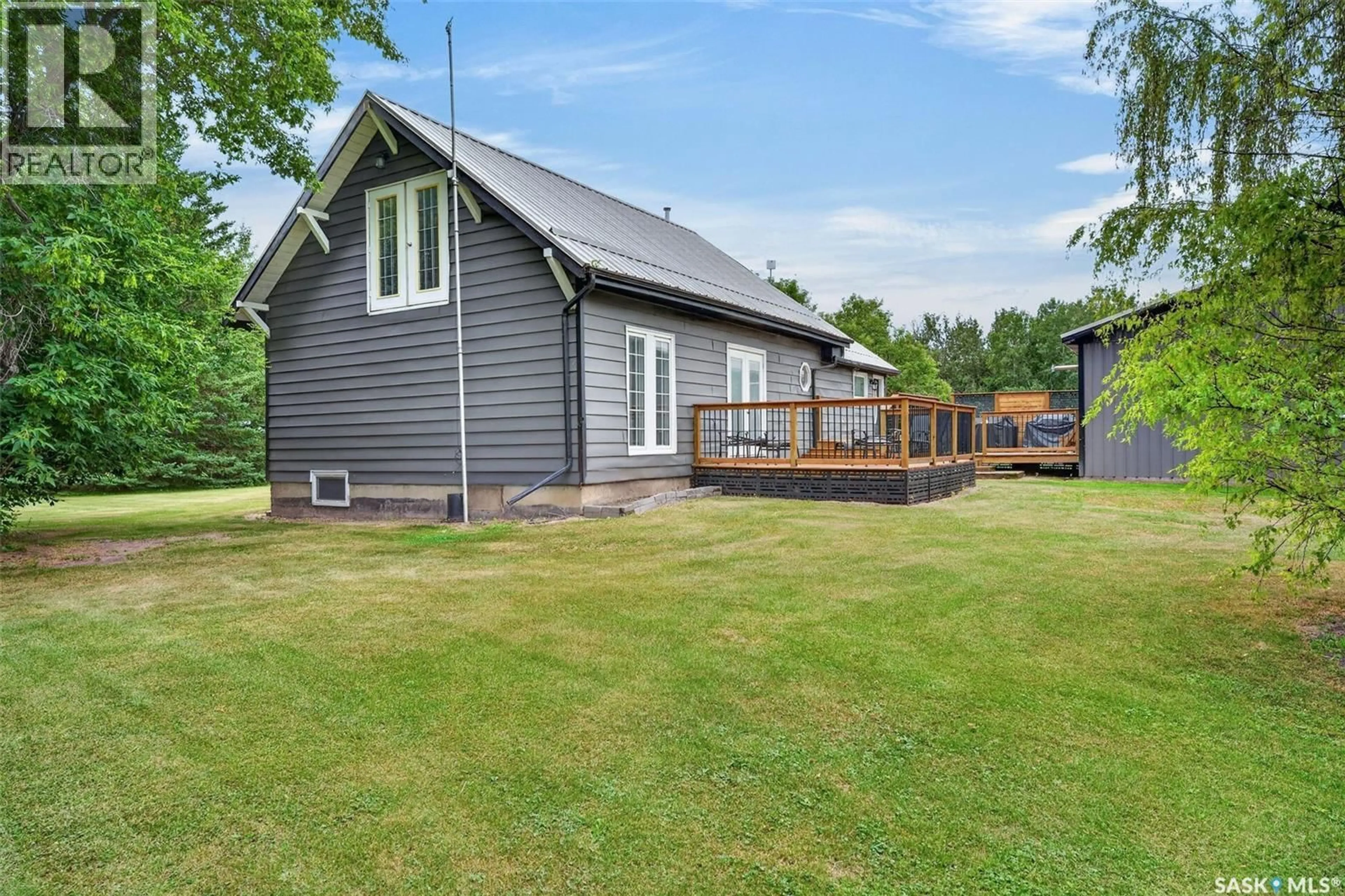 A pic from outside/outdoor area/front of a property/back of a property/a pic from drone, building for FIELDER ACREAGE, Spalding Rm No. 368 Saskatchewan S0K4C0