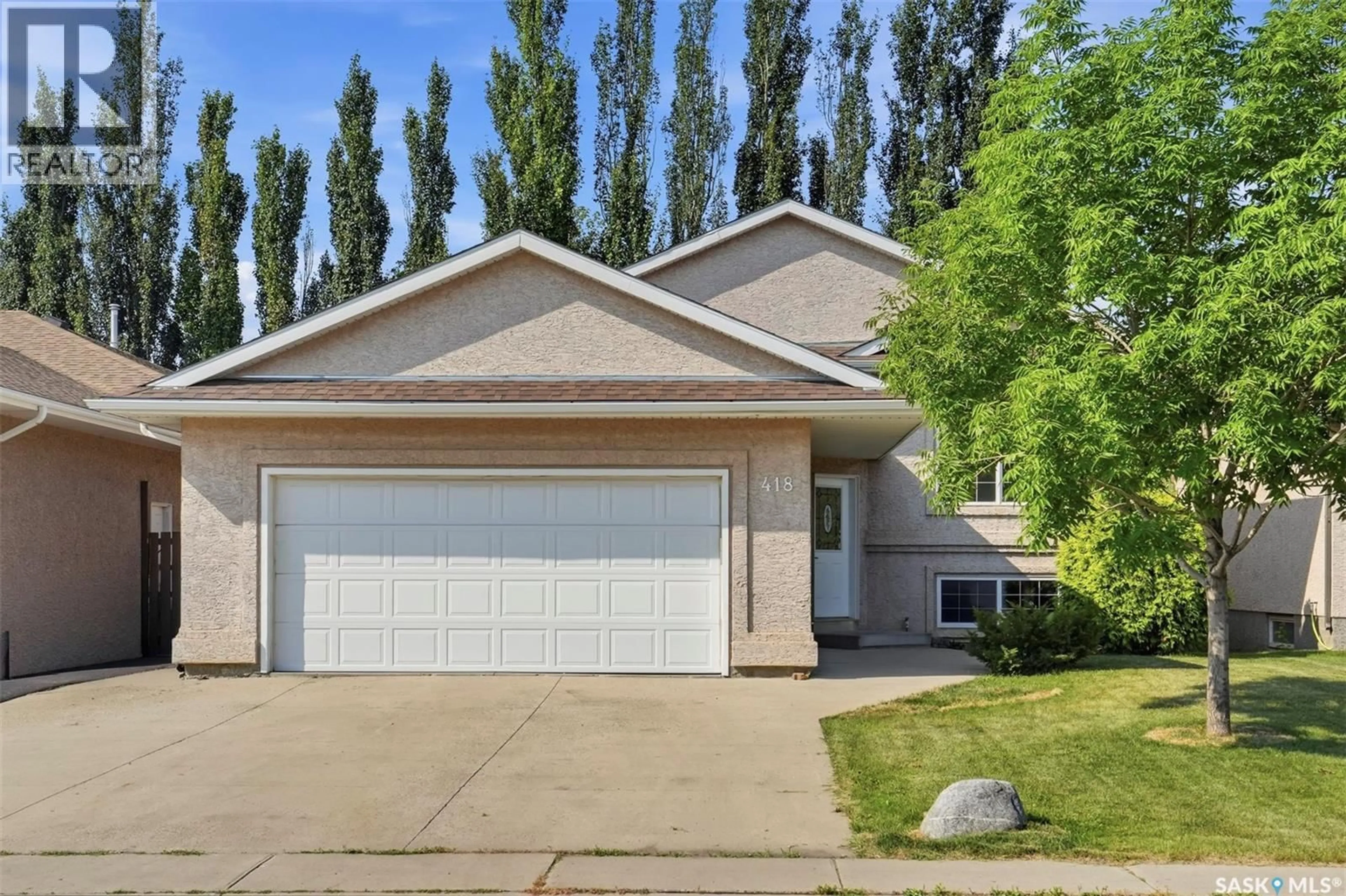 Home with vinyl exterior material, street for 418 GREAVES CRESCENT, Saskatoon Saskatchewan S7W1A9