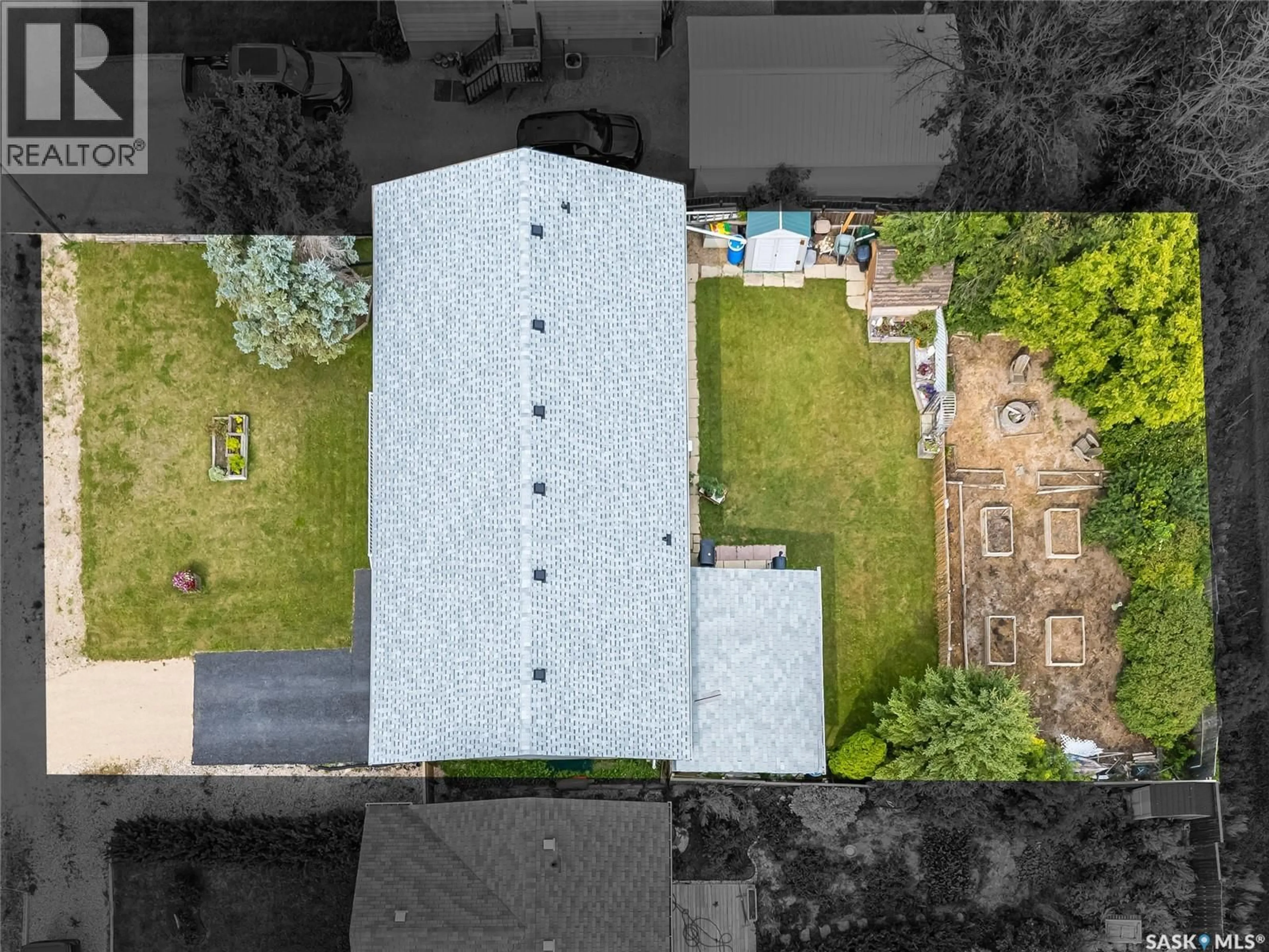 A pic from outside/outdoor area/front of a property/back of a property/a pic from drone, building for 102 ROSHER STREET, Colonsay Saskatchewan S0K0E8