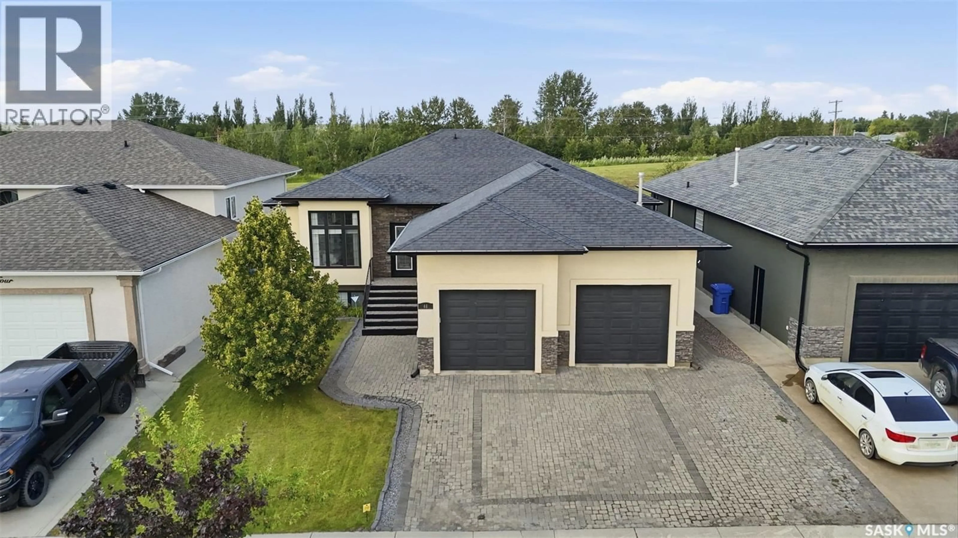 A pic from outside/outdoor area/front of a property/back of a property/a pic from drone, street for 46 GUY DRIVE, Prince Albert Saskatchewan S6X0A3