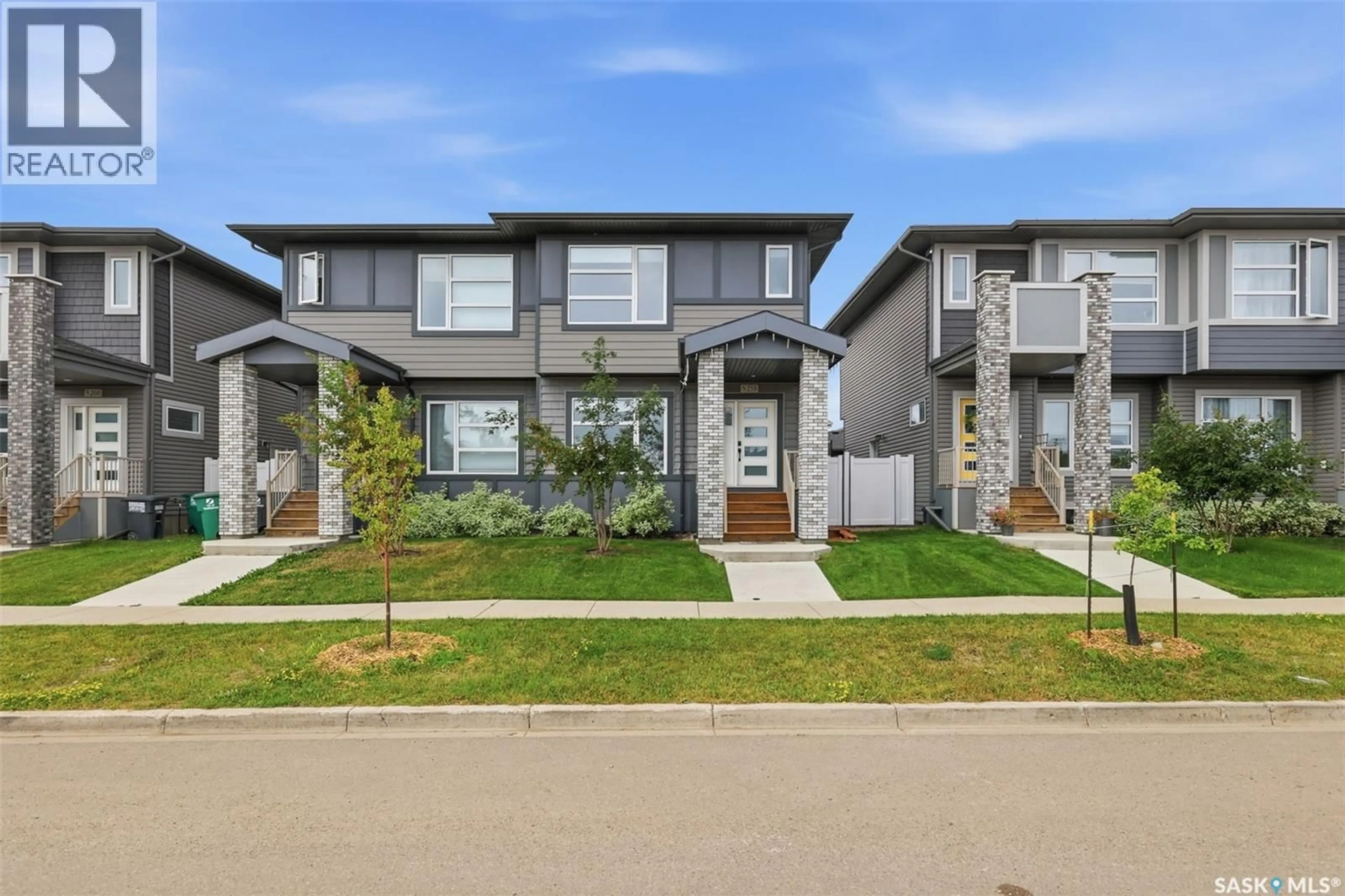 Home with brick exterior material, street for 258 BRIGHTON BOULEVARD, Saskatoon Saskatchewan S7V0V8