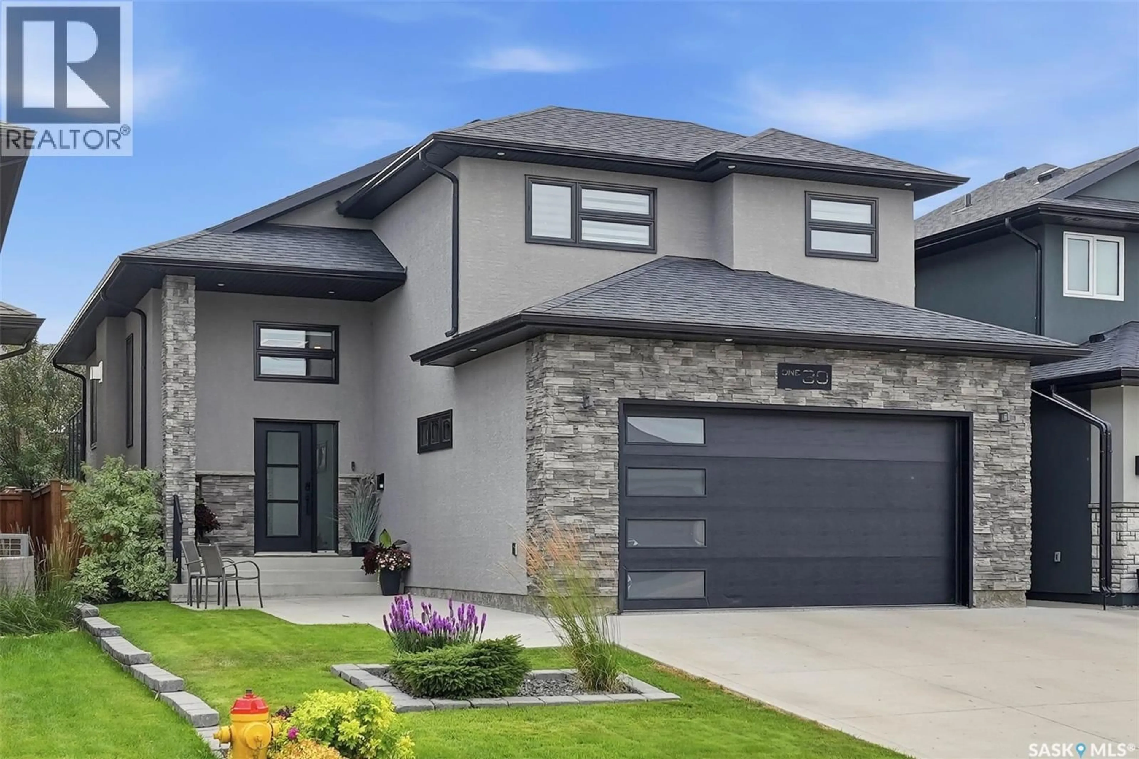 Home with brick exterior material, street for 130 BOYKOWICH BEND, Saskatoon Saskatchewan S7W0S2