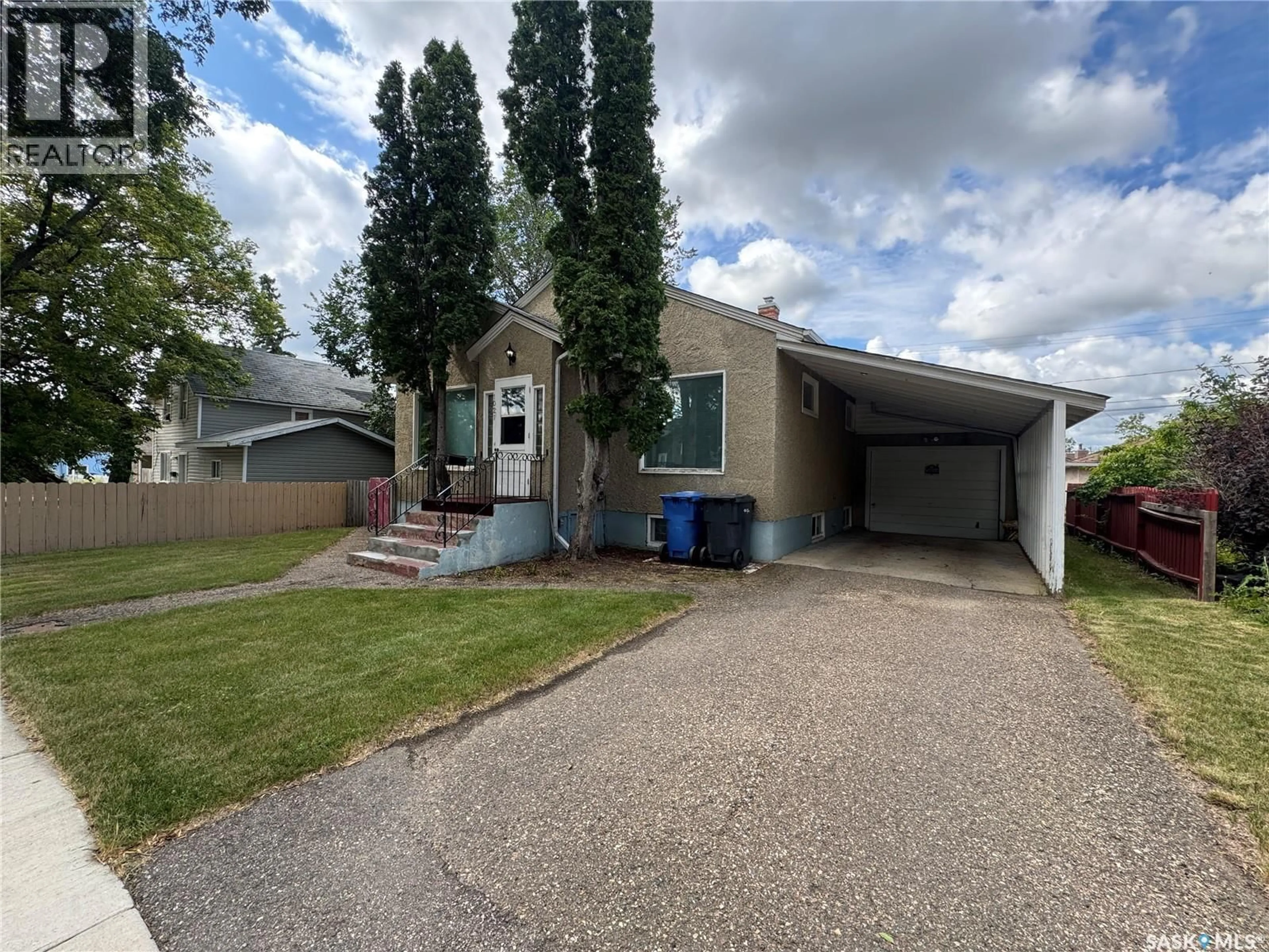 A pic from outside/outdoor area/front of a property/back of a property/a pic from drone, street for 1021 105TH STREET, North Battleford Saskatchewan S9A1S4