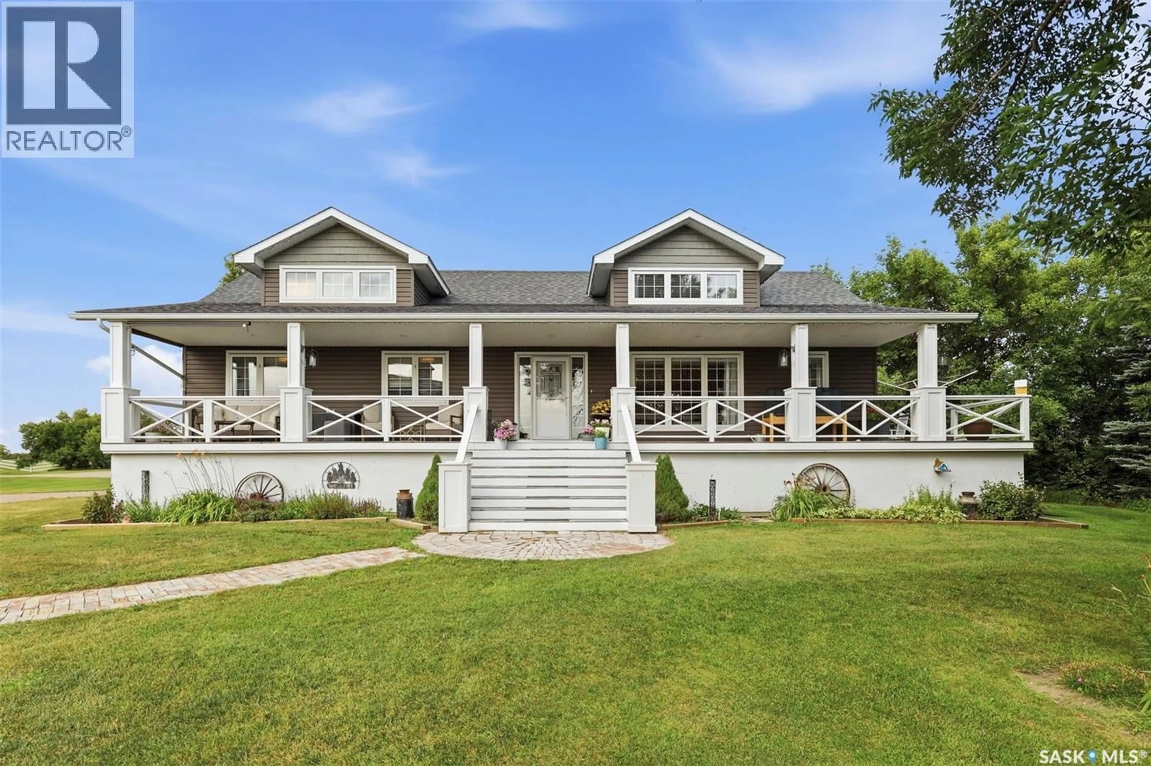 Home with vinyl exterior material, unknown for Rural Address - NAISMITH ACREAGE, Young Saskatchewan S0K4M0