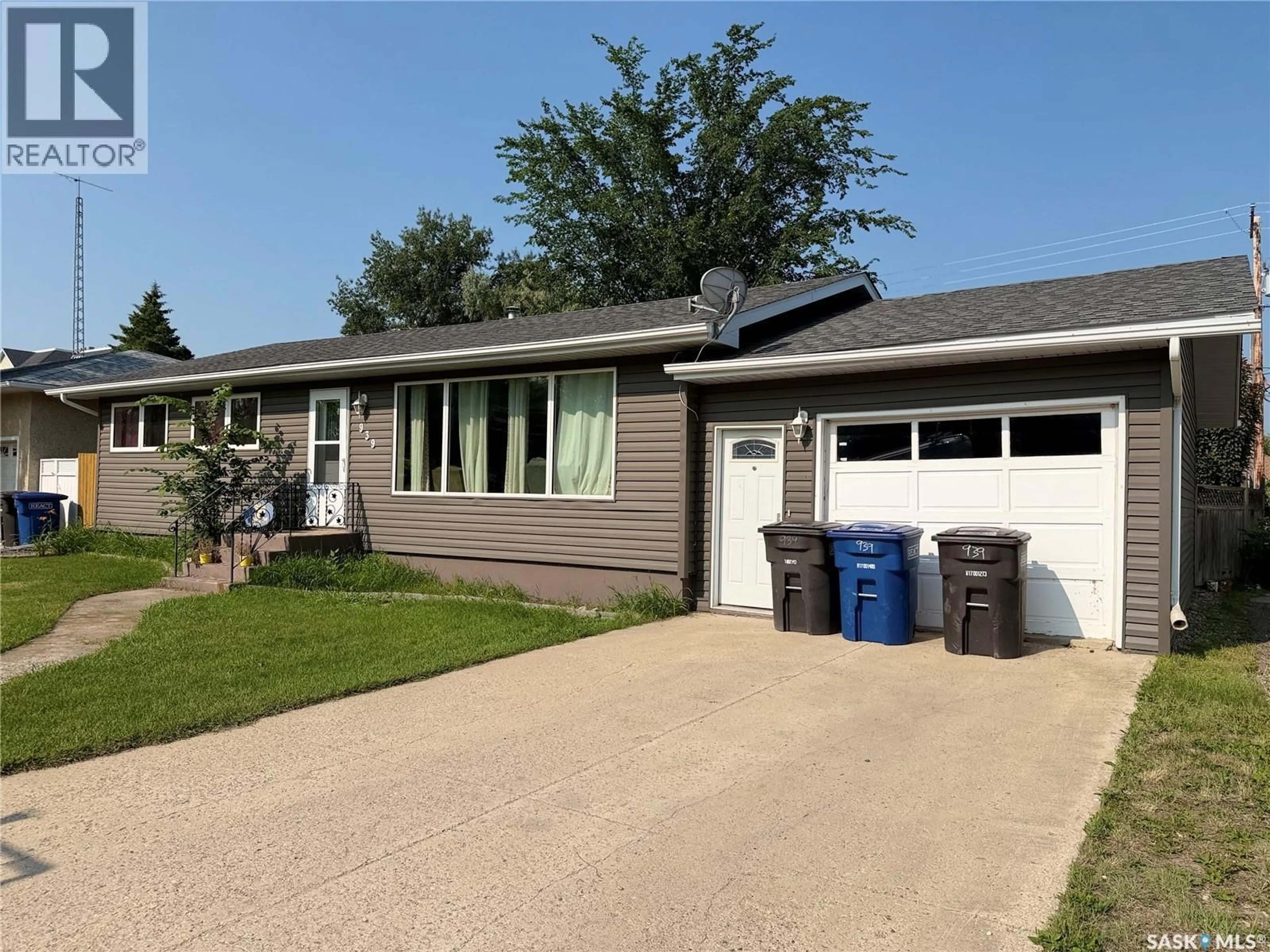 Home with vinyl exterior material, street for 939 7TH STREET, Humboldt Saskatchewan S0K2A0