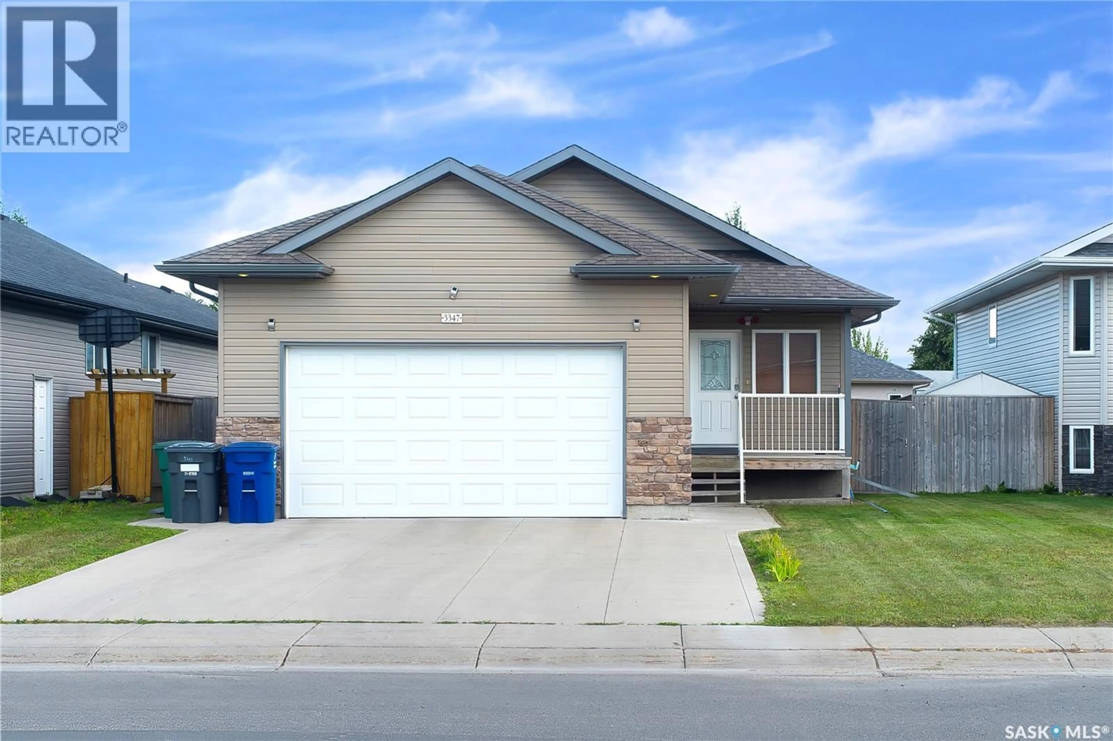 Home with vinyl exterior material, street for 3347 MCCLOCKLIN ROAD, Saskatoon Saskatchewan S7R0B3