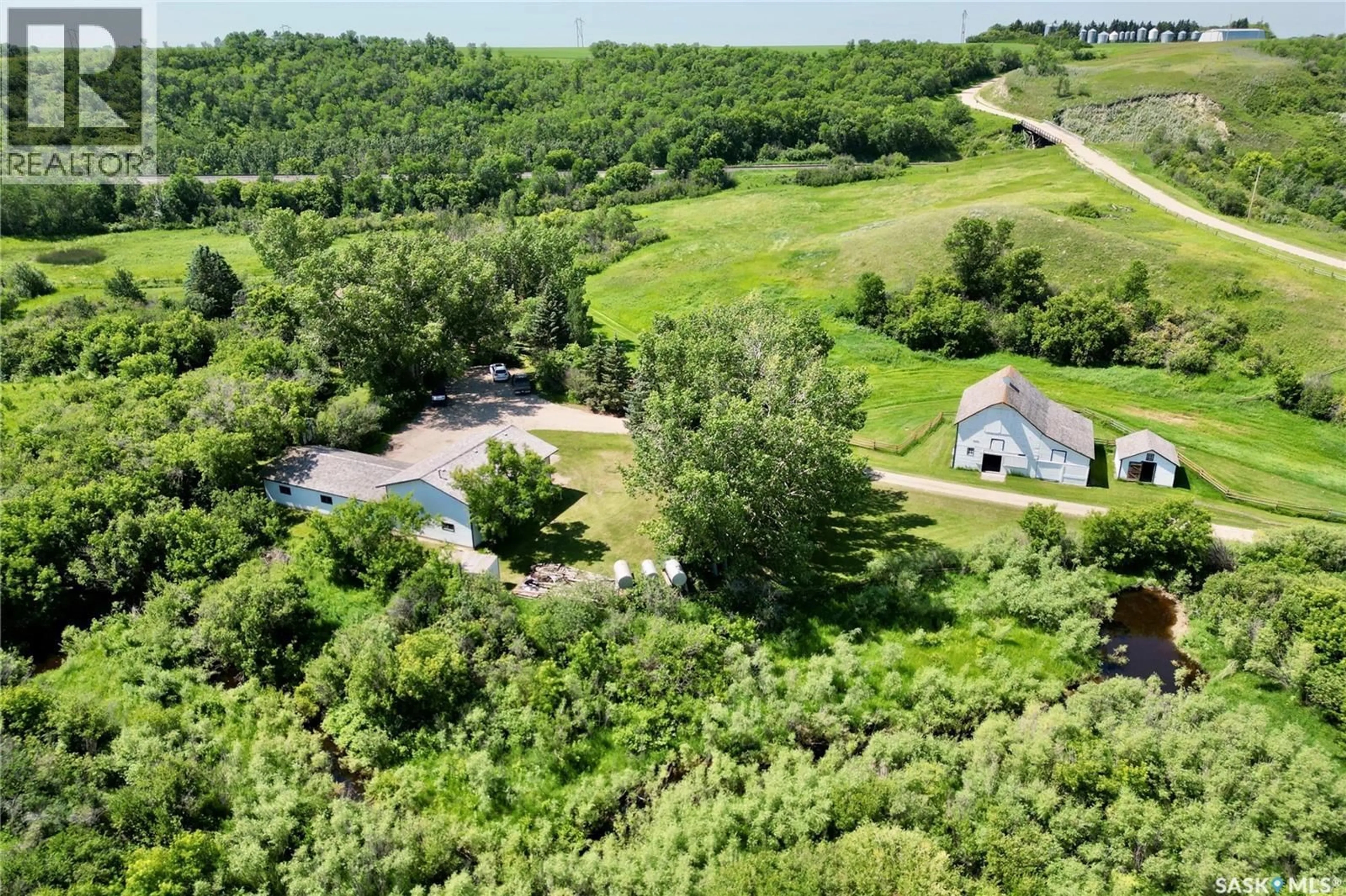 A pic from outside/outdoor area/front of a property/back of a property/a pic from drone, water/lake/river/ocean view for FLYING CREEK HOMESTEAD, Lumsden Rm No. 189 Saskatchewan S0G3C0