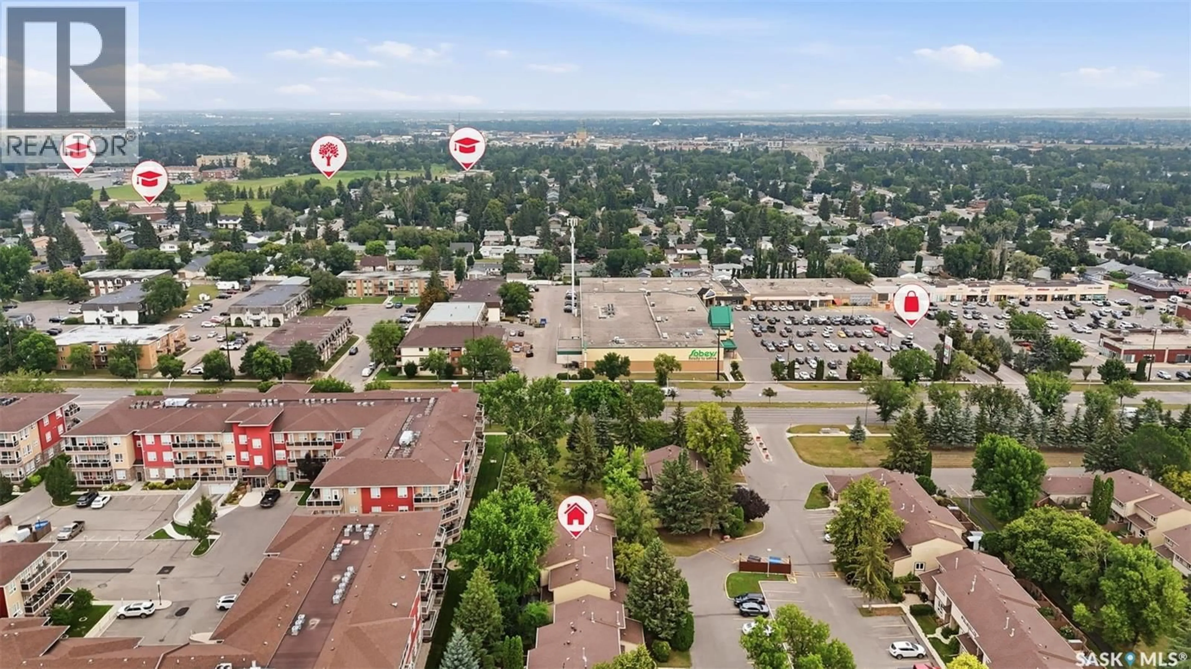 A pic from outside/outdoor area/front of a property/back of a property/a pic from drone, unknown for 9 - 1128 MCKERCHER DRIVE, Saskatoon Saskatchewan S7H4Y7
