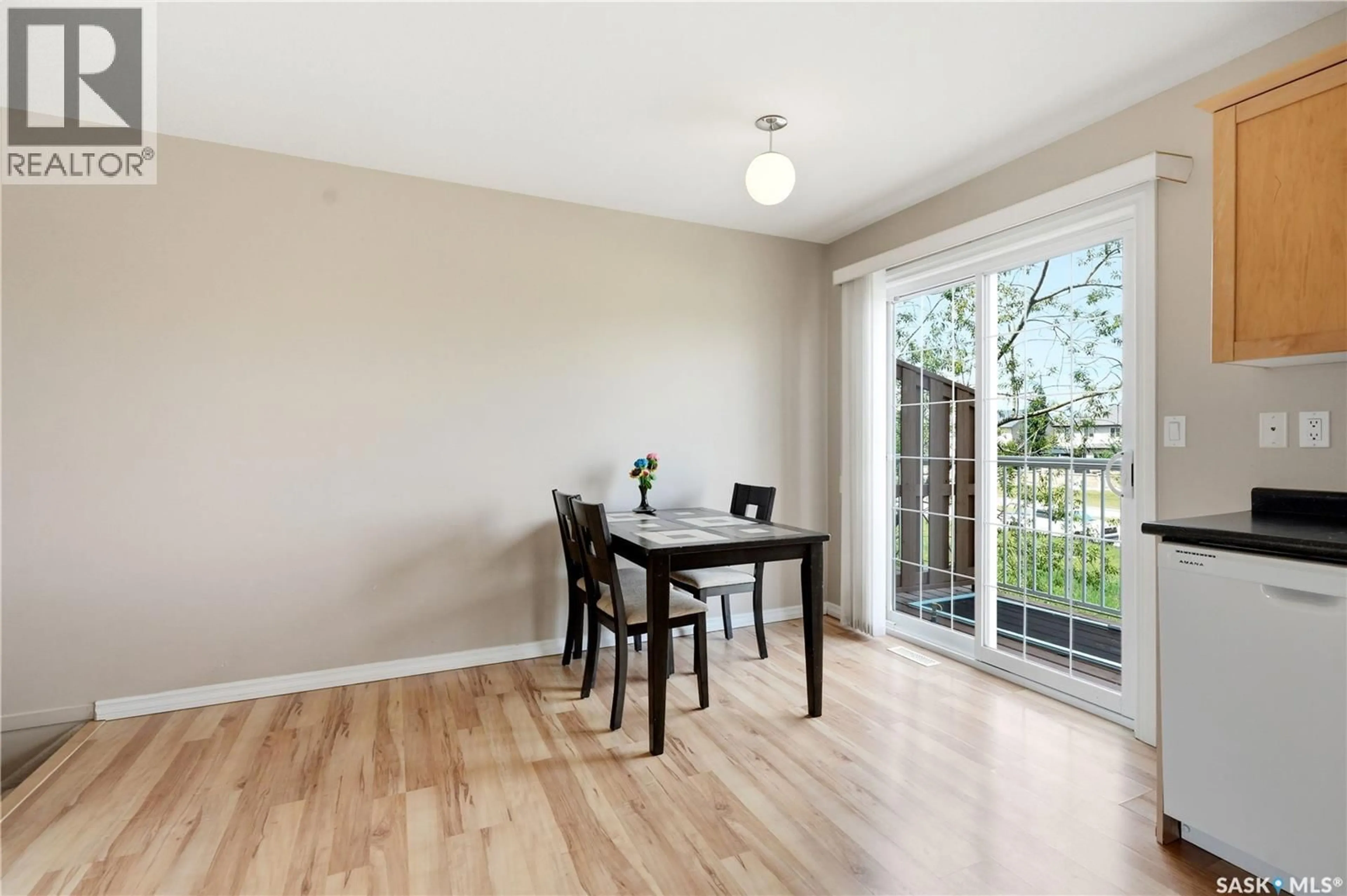 Dining room, wood/laminate floor for 118 - 52 PAWLYCHENKO LANE, Saskatoon Saskatchewan S7V1K1