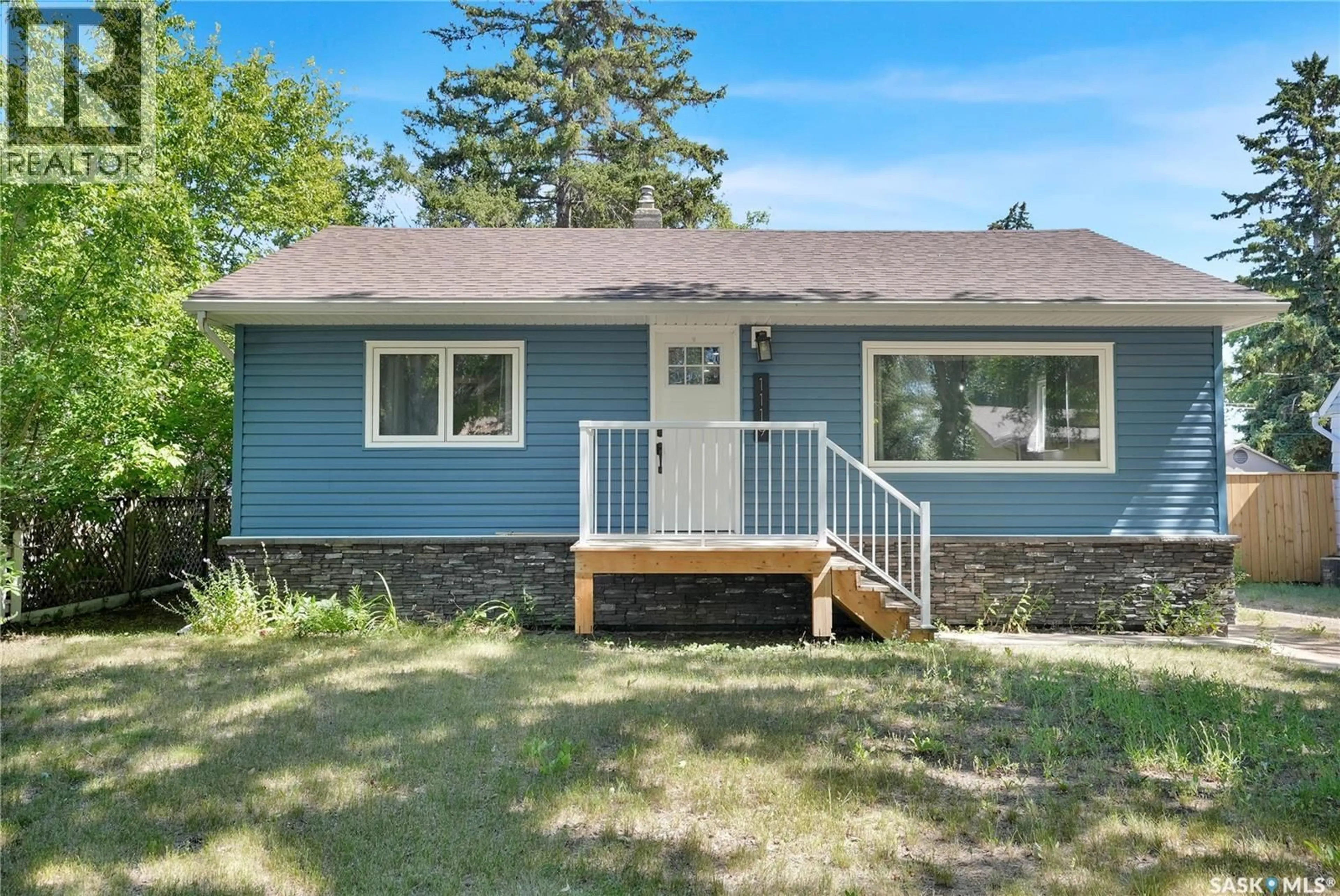 Home with vinyl exterior material, street for 1119 ELGIN AVENUE, Moose Jaw Saskatchewan S6H4G9