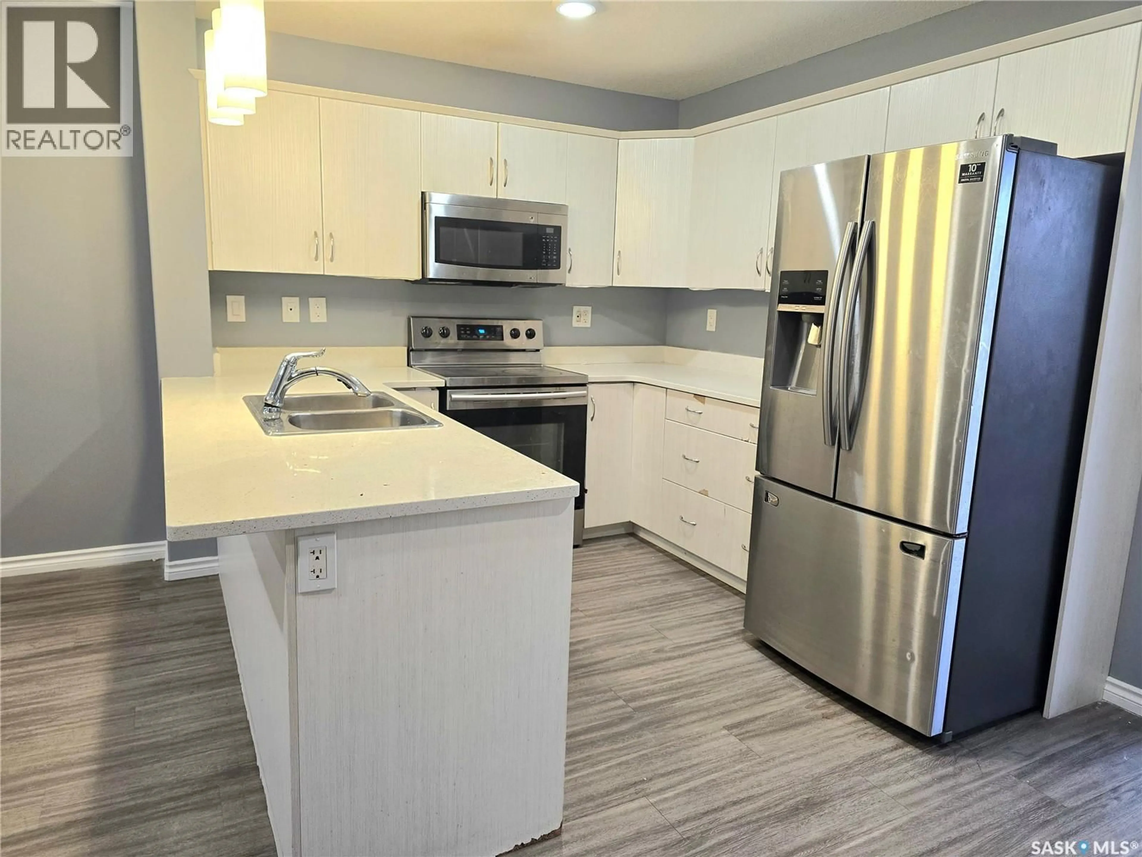 Open concept kitchen, unknown for 110 - 510 AKHTAR BEND, Saskatoon Saskatchewan S7W0Y9