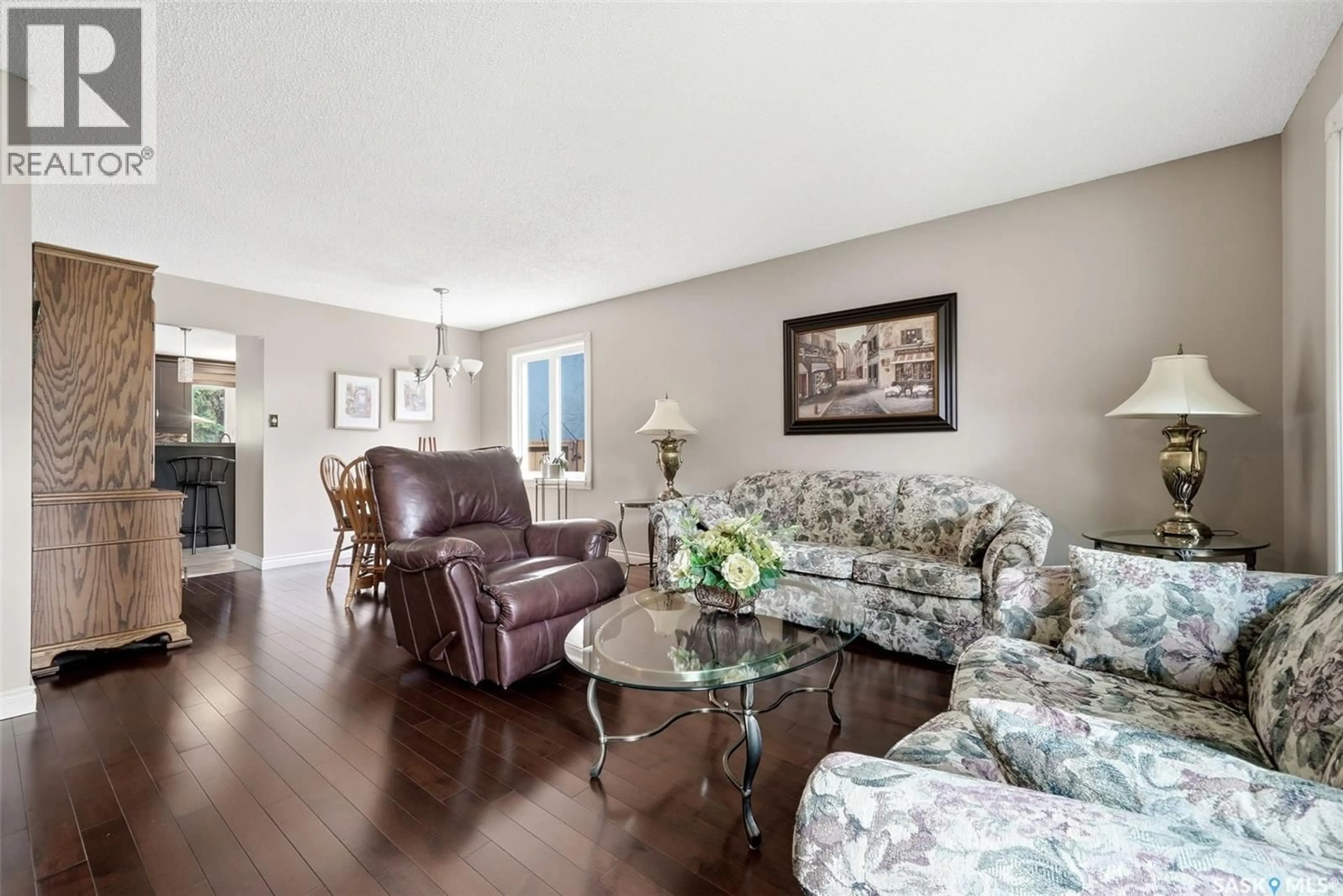 Living room with furniture, wood/laminate floor for 2118 ELDERKIN DRIVE, Regina Saskatchewan S4V1N7