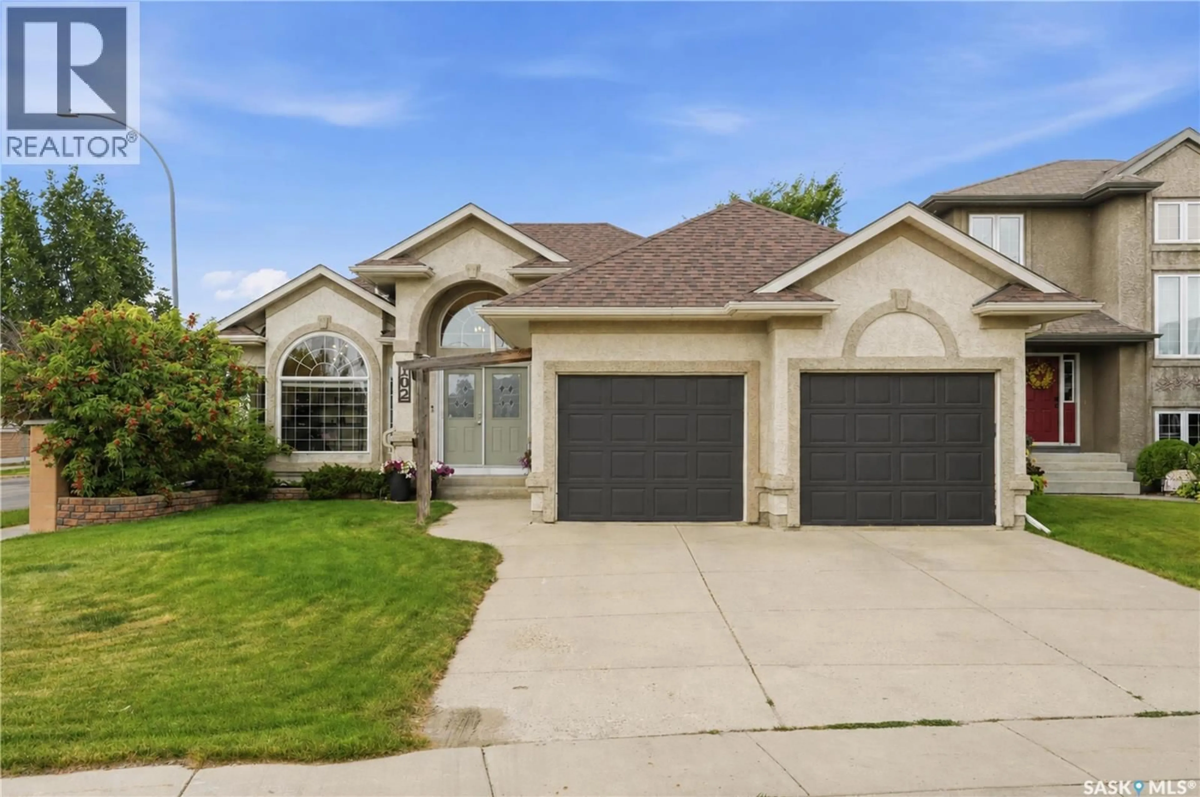 Home with vinyl exterior material, street for 102 BROOKDALE CRESCENT, Saskatoon Saskatchewan S7V1K5